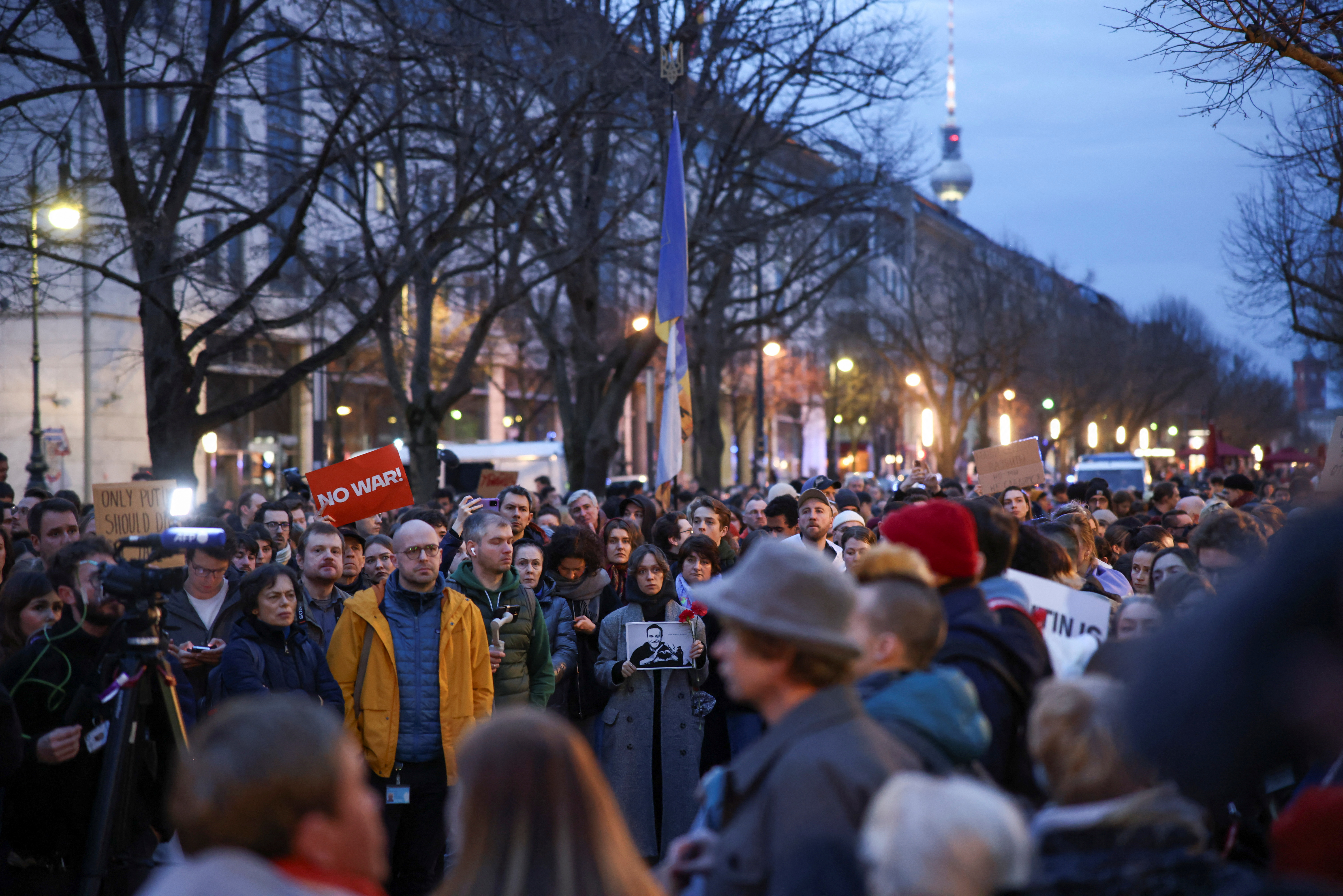 People attend a vigil held in front of Russian embassy in Berlin after the death of Russian opposition leader Alexei Navalny, Germany, February 16, 2024. 