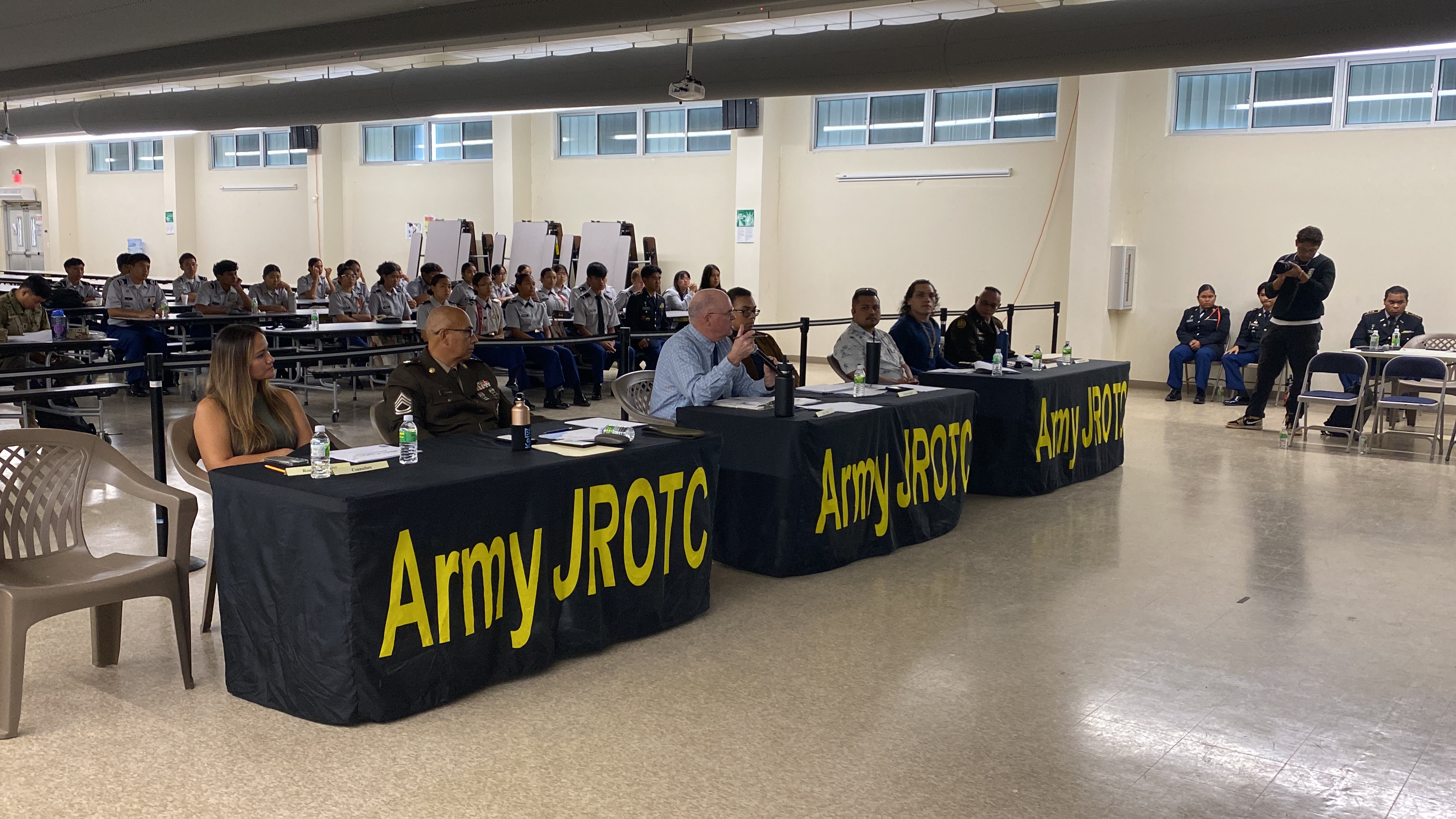Mark Allen Pratt, 3rd left, front row, asks a question during Quidato's presentation. Pratt is the chief of the Junior Reserve Officers’ Training Corps Operations for the 8th Brigade of the U.S. Army Cadet Command at Joint Base Lewis-McChord in Washington state. 