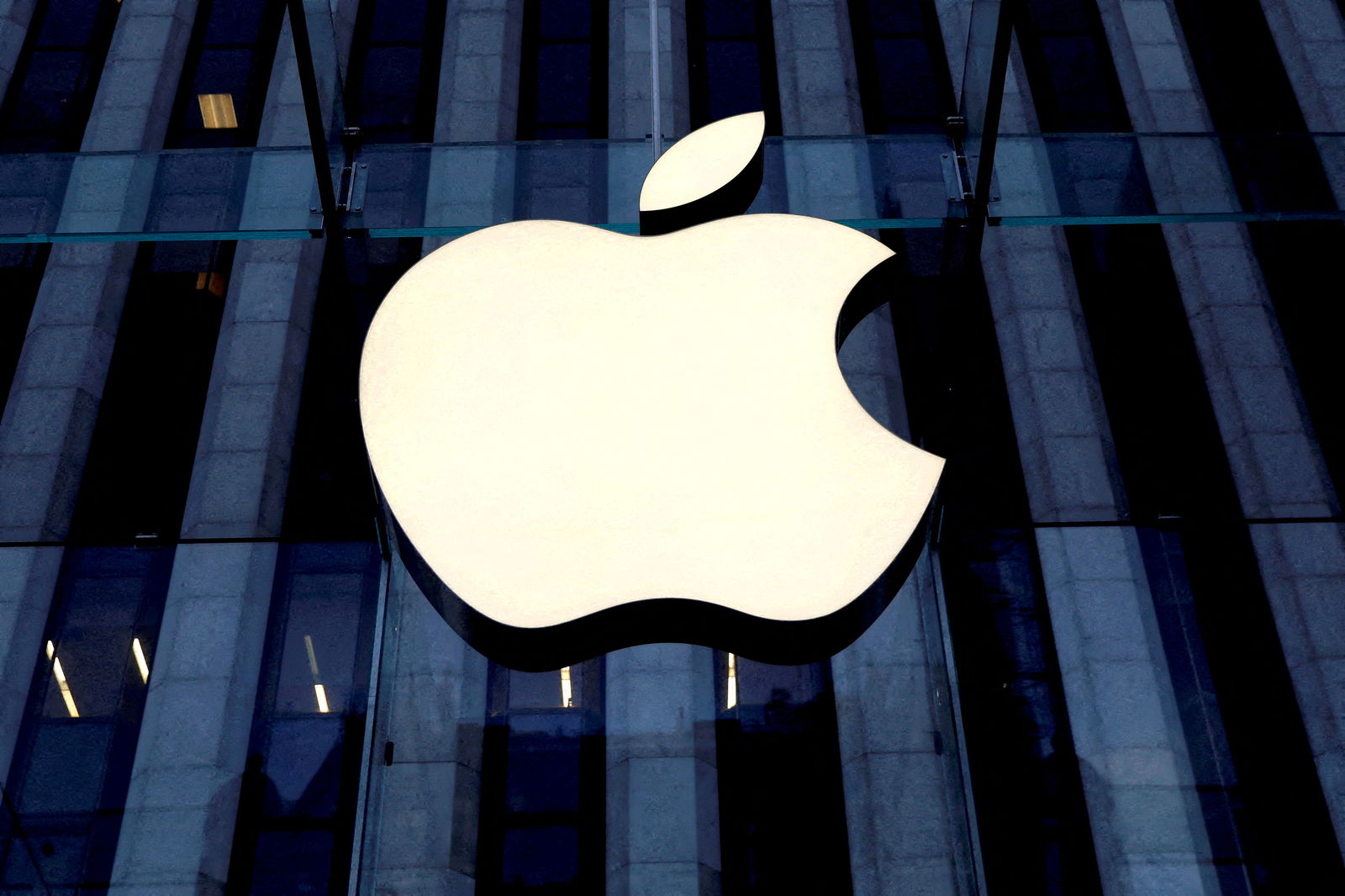 The Apple logo is seen hanging at the entrance to the Apple store on 5th Avenue in Manhattan, New York, U.S., October 16, 2019. 