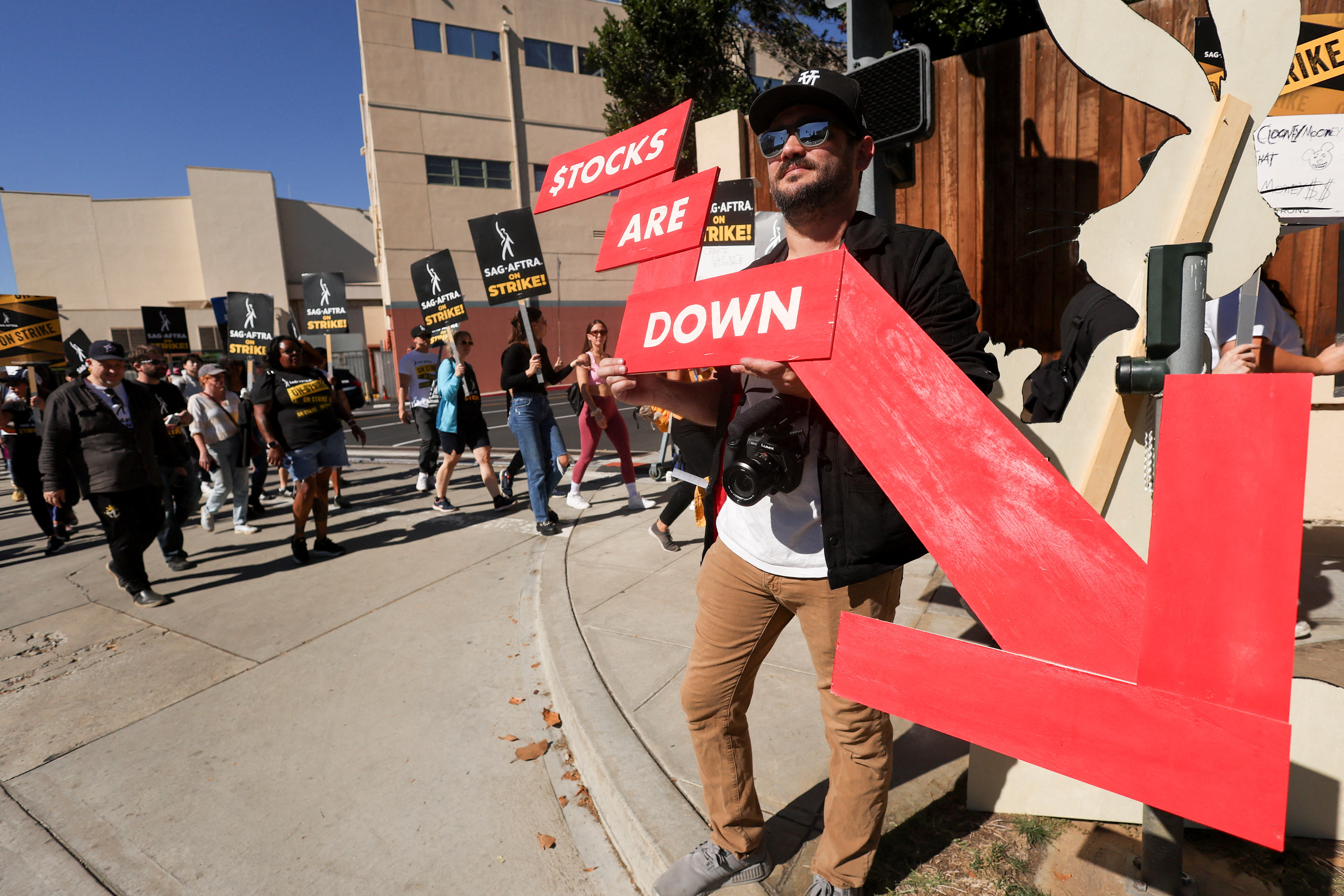 SAG-AFTRA members walk the picket line during their ongoing strike outside Disney Studios in Burbank, California, U.S., November 1, 2023. 