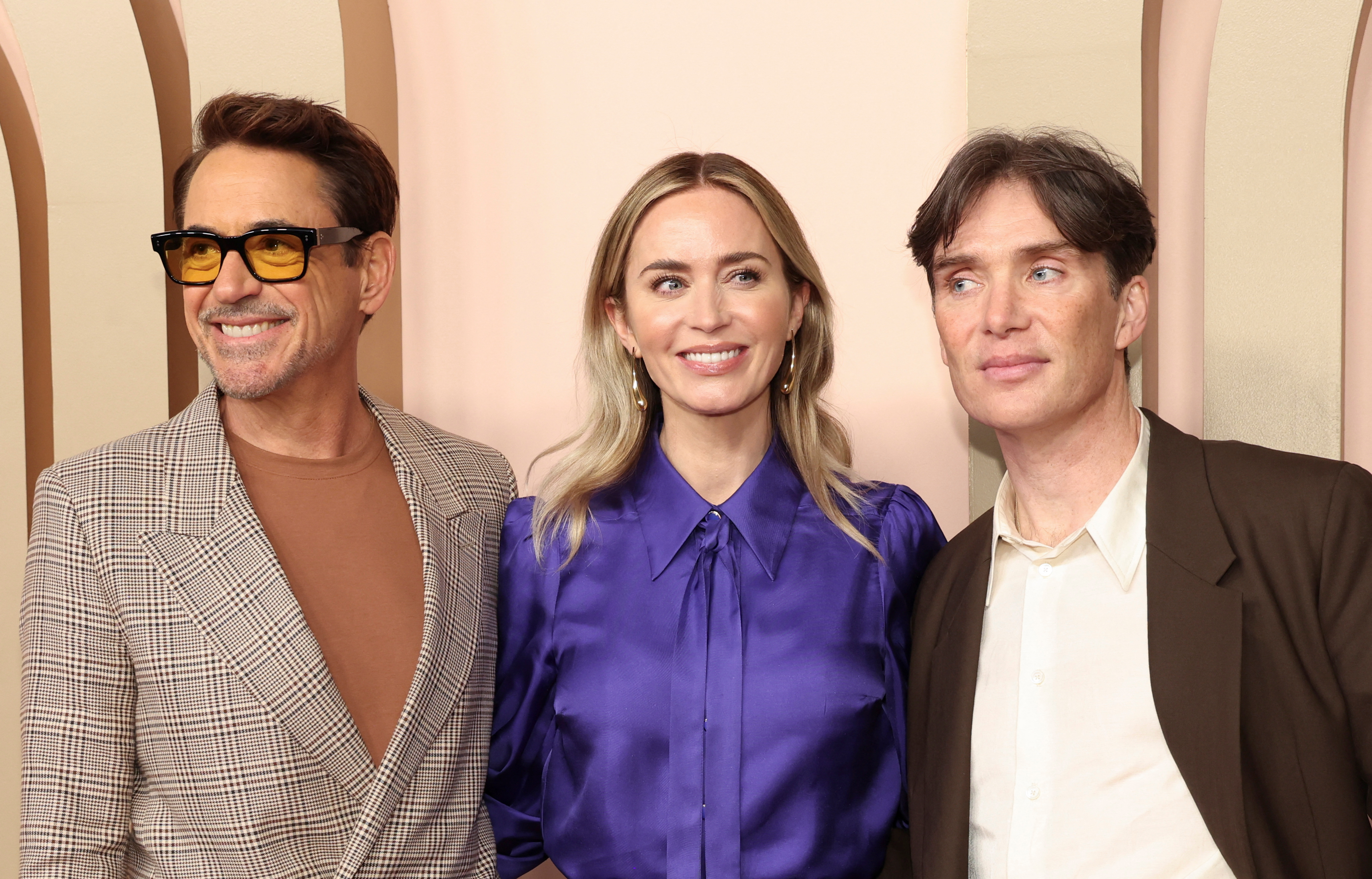 Cillian Murphy, nominated for Best Actor in a Leading Role, for "Oppenheimer", Robert Downey Jr., nominated for Best Actor in a Supporting Role, for "Oppenheimer", and Emily Blunt, nominated for Best Actress in a Supporting Role, for "Oppenheimer" which is also nominated for Best Adapted Screenplay and Best Picture, attend the Nominees Luncheon for the 96th Oscars in Beverly Hills, California, U.S. February 12, 2024. 