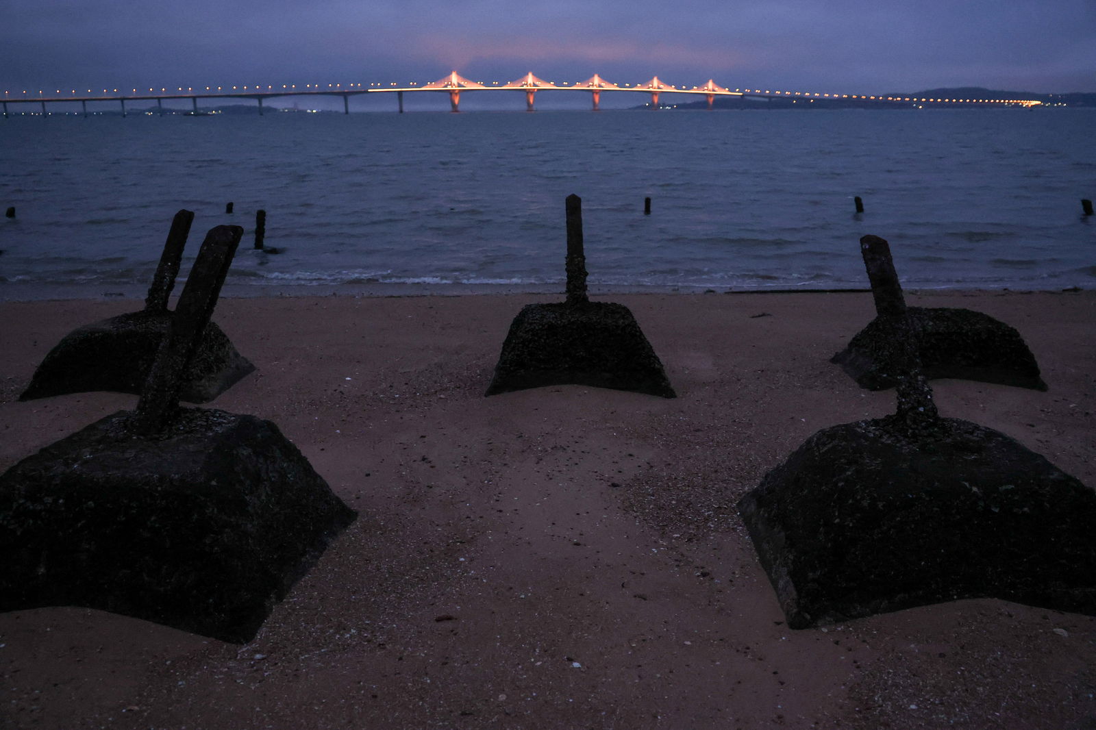 Anti-landing barricades are seen on the beach in Kinmen, Taiwan February 20, 2024. 