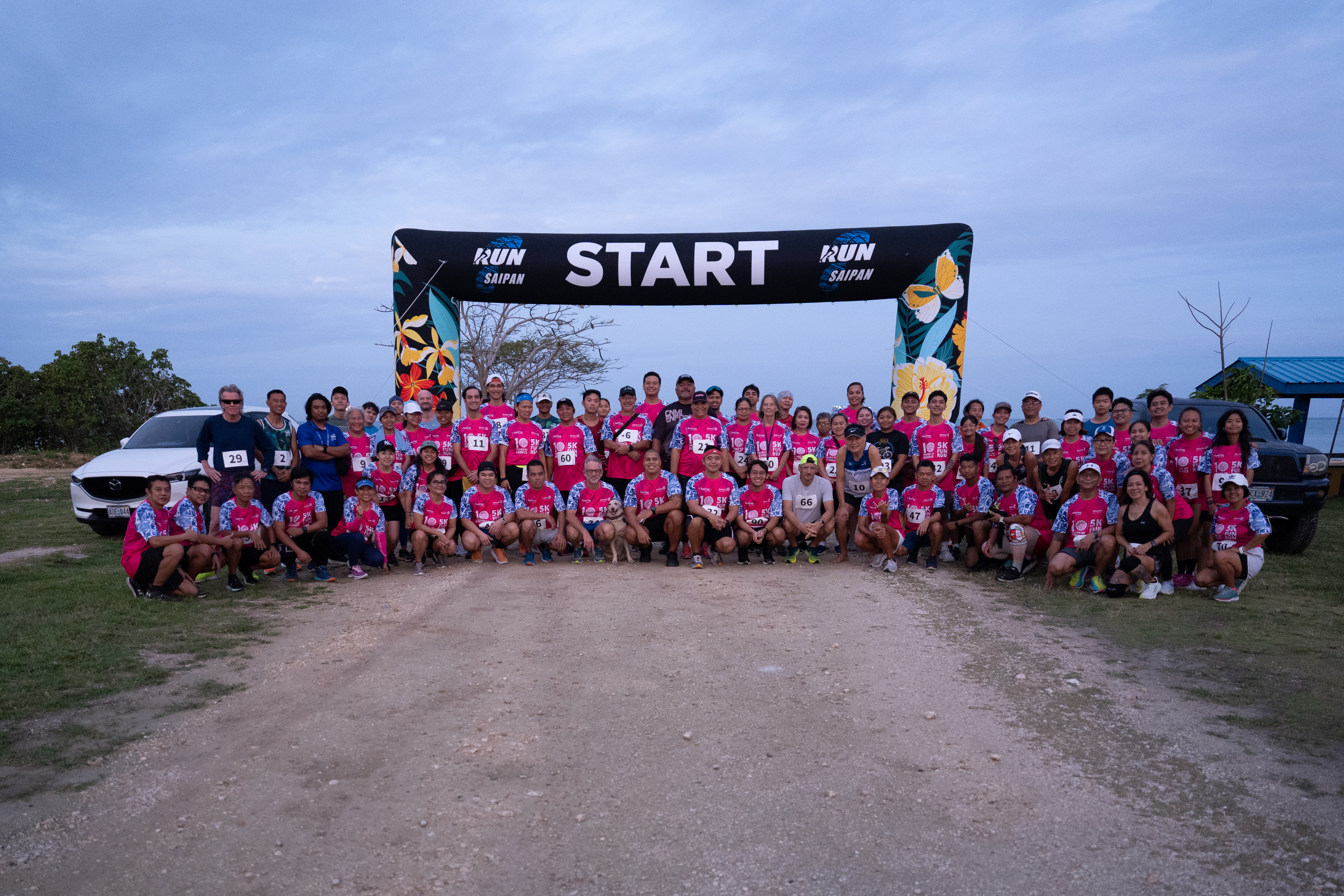 The participants of the Rotaract Club of Saipan 5K Fun Run pose for a photo at the Garapan Fishing Base on Saturday.
