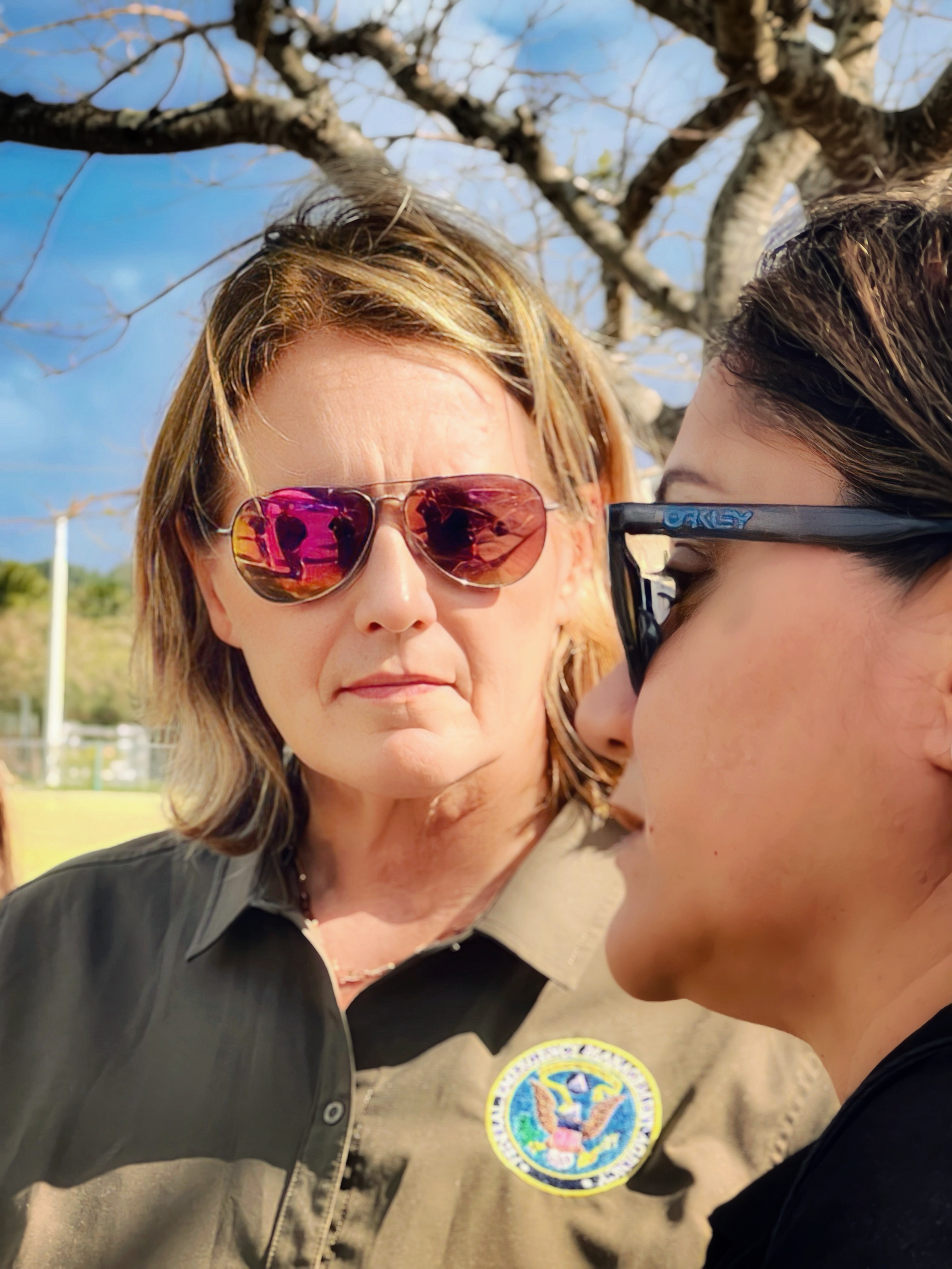 FEMA Administrator Deanne Criswell listens to Acting Commissioner of Education Donna M. Flores as she pleads for Hopwood’s speedy reconstruction.