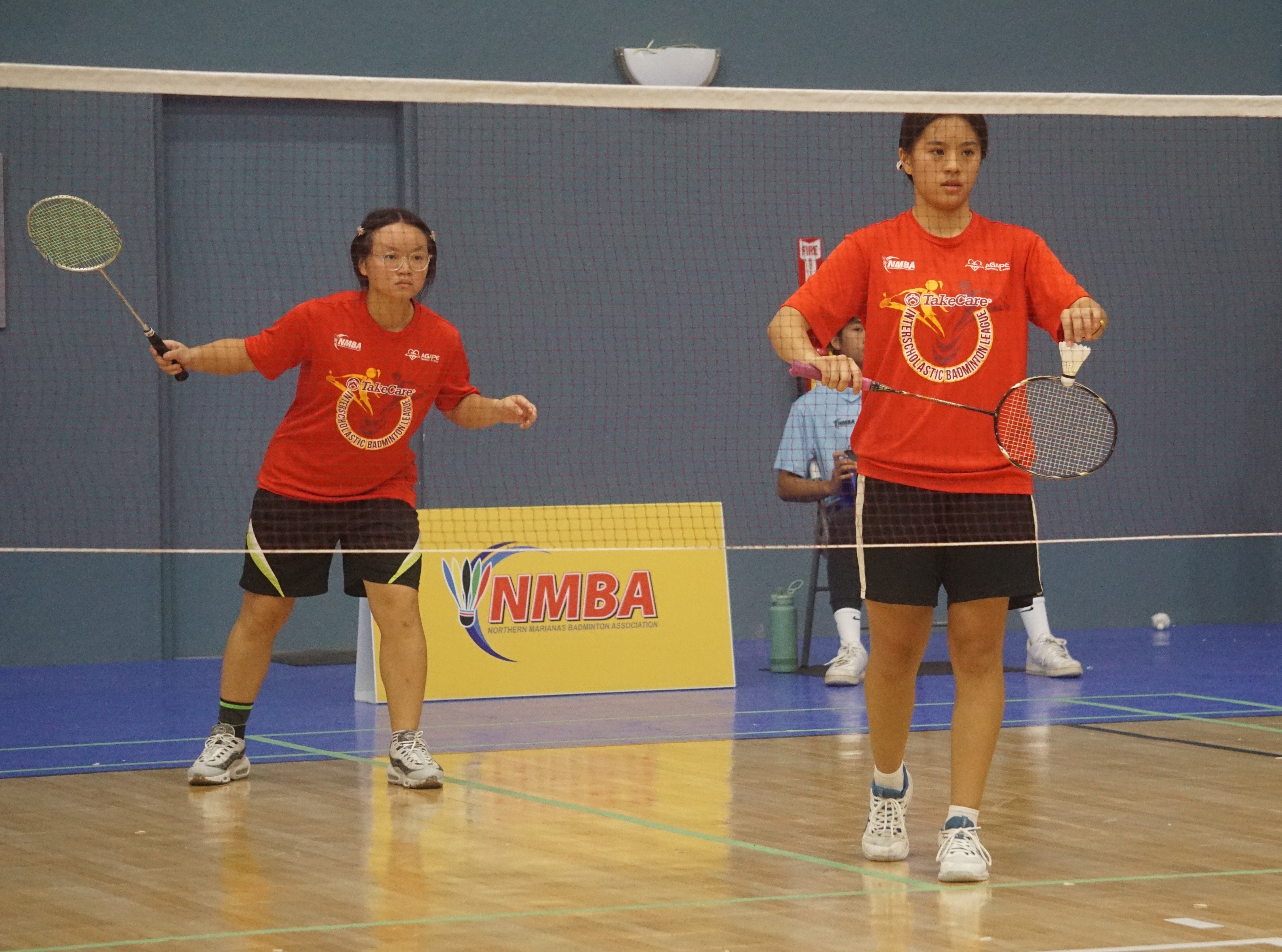 ACS gets ready for the serve during a women's doubles event in the co-ed high school division of the NMBF-PSS Interscholastic Badminton League SY23-24 at the Ada gym on Saturday.