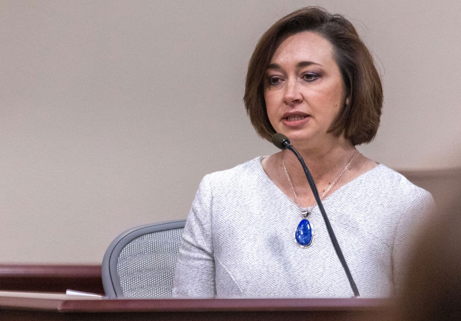 Dr. Heather Jarell, chief medical investigator for the Office of the Medical Investigator, testifies from the witness stand at District Court, in Santa Fe, New Mexico, U.S., February 27, 2024. 