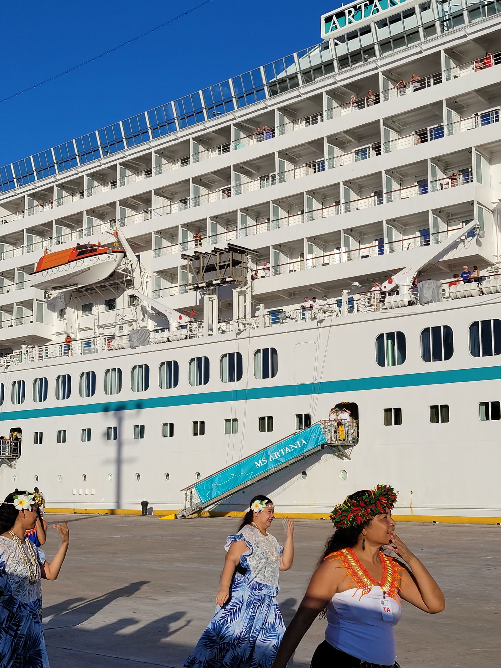 The MS Artania is welcomed with indigenous Chamorro and Carolinian dances at the Port of Saipan on Feb. 26, 2024. The cruise ship has 1,039 passengers and 531 crewmembers aboard, taking advantage of the opportunity to tour Saipan for the day.
