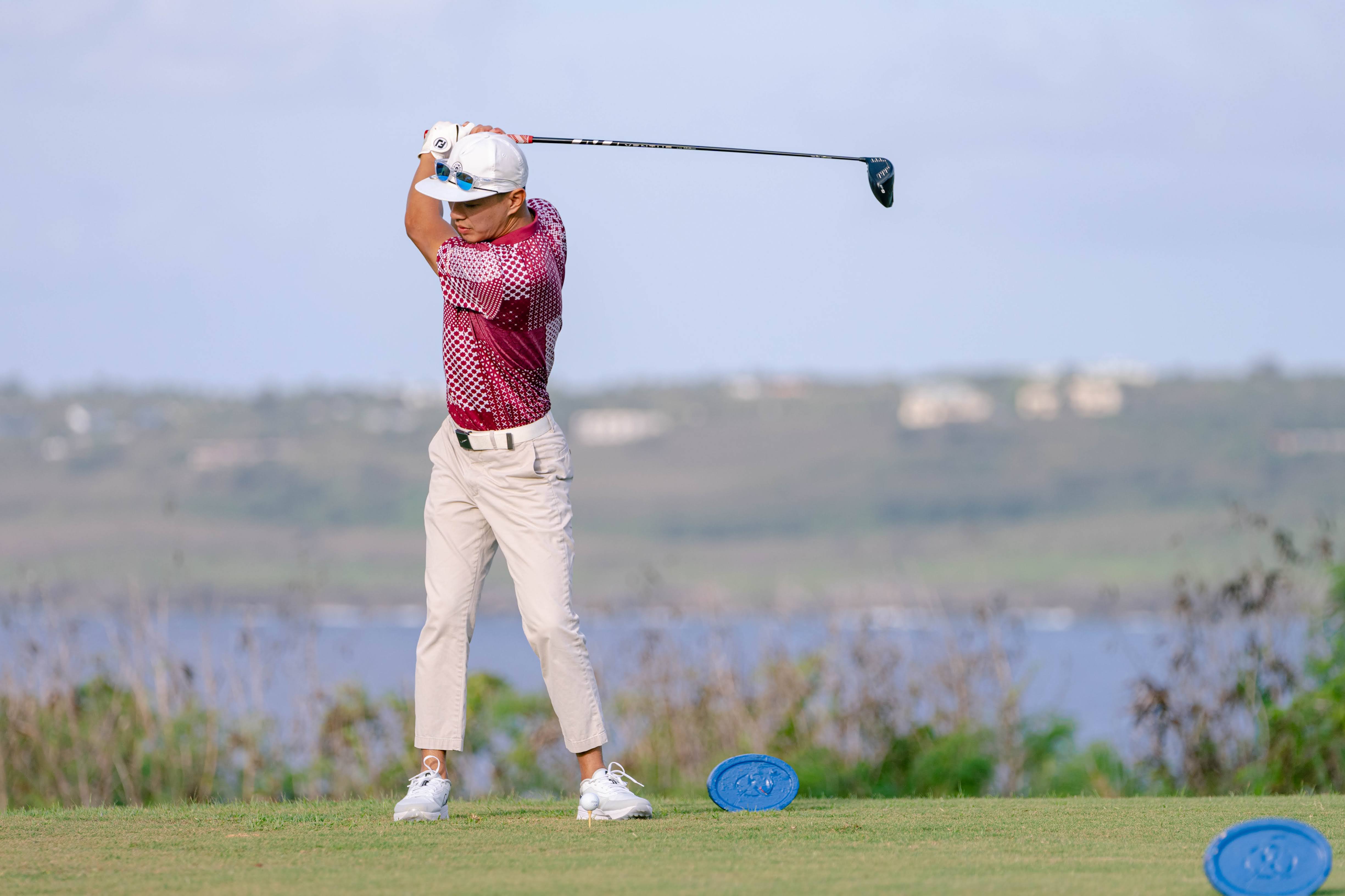  A golfer tees off at NMC Foundation's Golf Open in 2023.