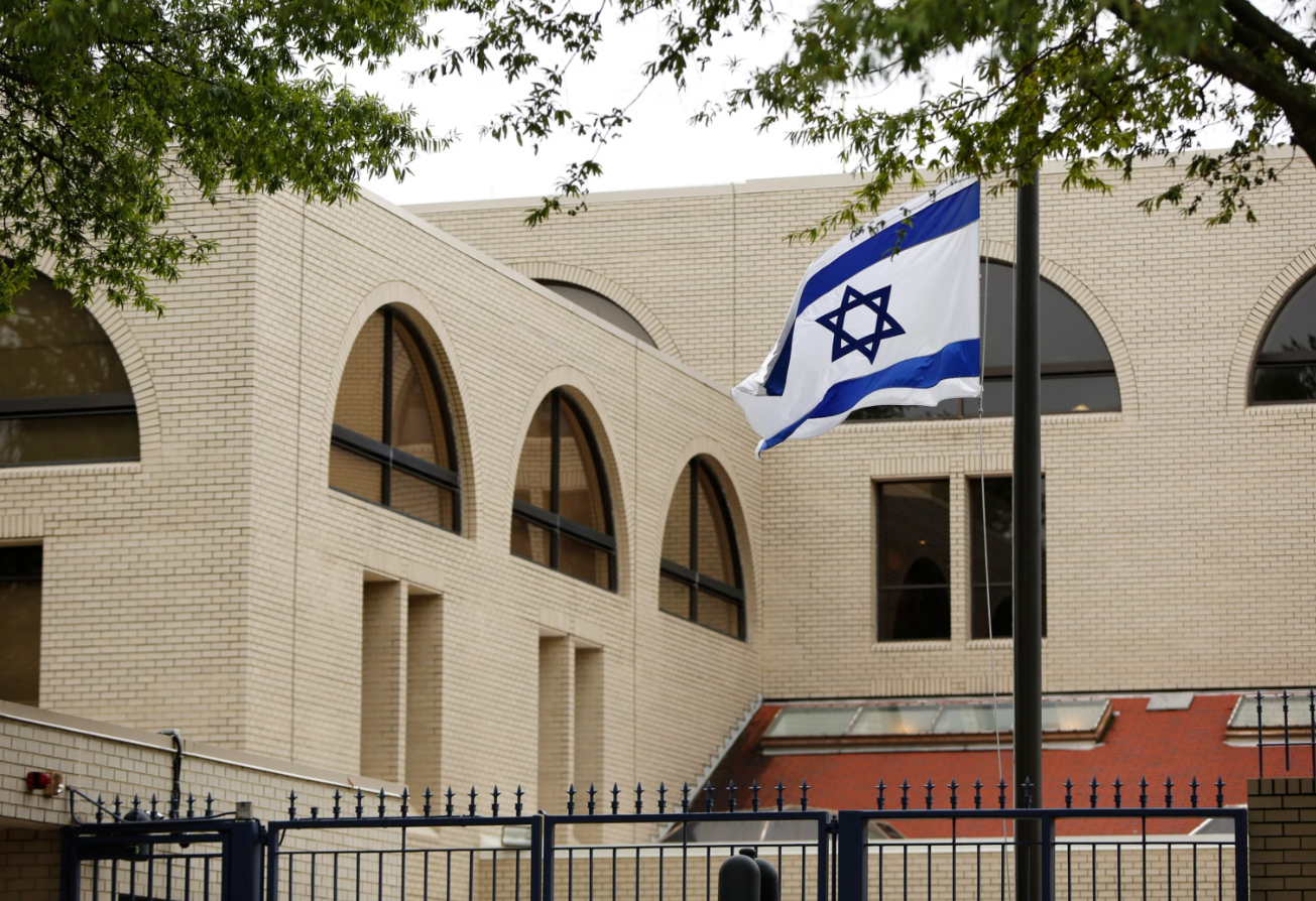 The Israeli flag flies at half-staff in memory of former Israeli President and Prime Minister Shimon Peres at the Israeli Embassy in Washington, D.C. on Sept. 30, 2016.