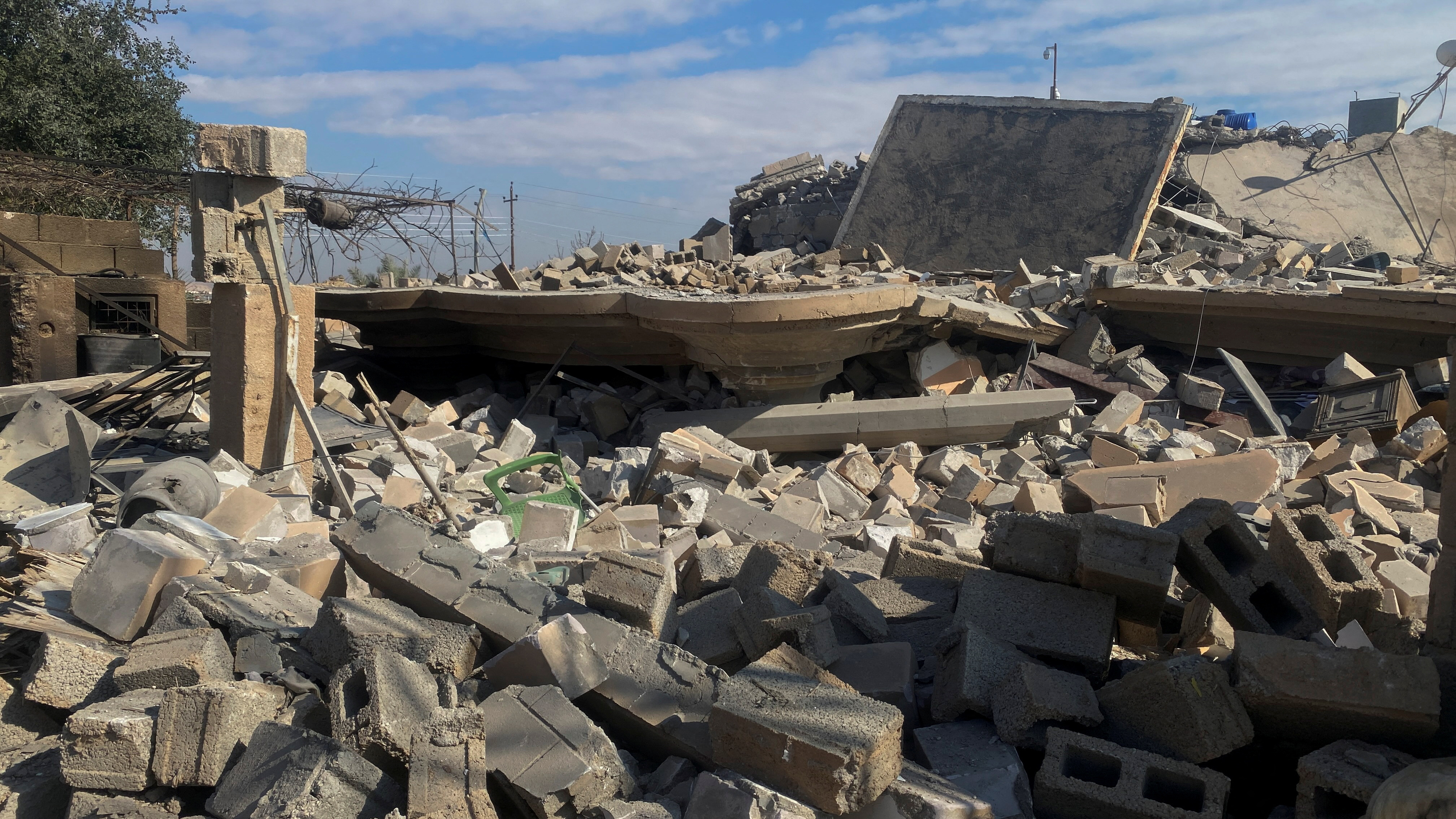 A destroyed building is pictured at the site of a U.S. airstrike in al-Qaim, Iraq February 3, 2024. 