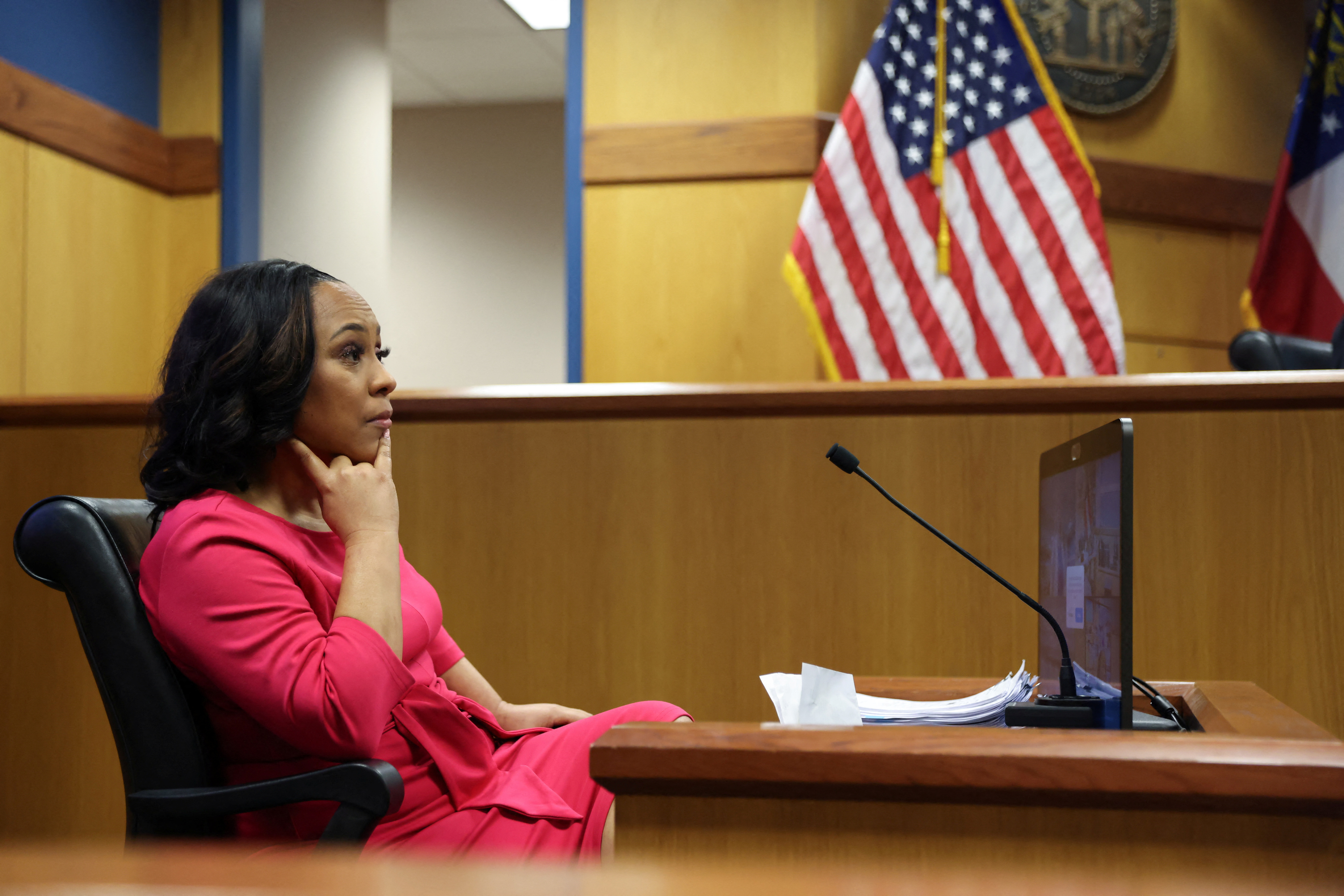 Attorney Fani Willis takes the stand as a witness during a hearing in the case of State of Georgia v. Donald John Trump at the Fulton County Courthouse in Atlanta, Georgia, U.S., February 15, 2024.