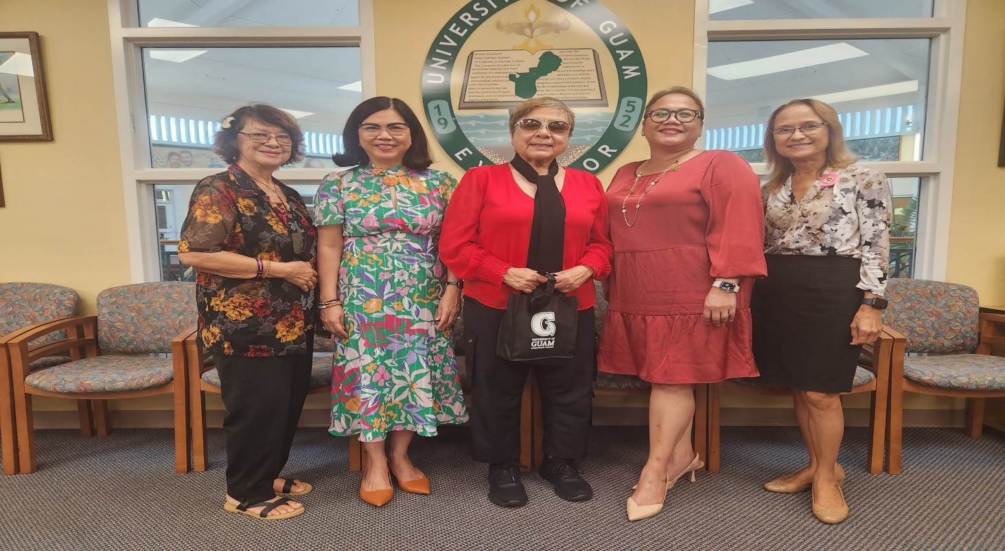 From left, Marian Deleon Guerrero Tudela, chairwoman, 17th Saipan & Northern Islands Municipal Council; Dr. Anita Enriquez, University of Guam president;  Tonie Manibusan Tudela, vice chairwoman, 17th Saipan & Northern Islands Municipal Council; Dr. Sharleen Santos-Bamba,  UOG interim senior vice president and provost accreditation liaison officer; and Dr. Alicia Aguon, UOG dean of the School of Education.