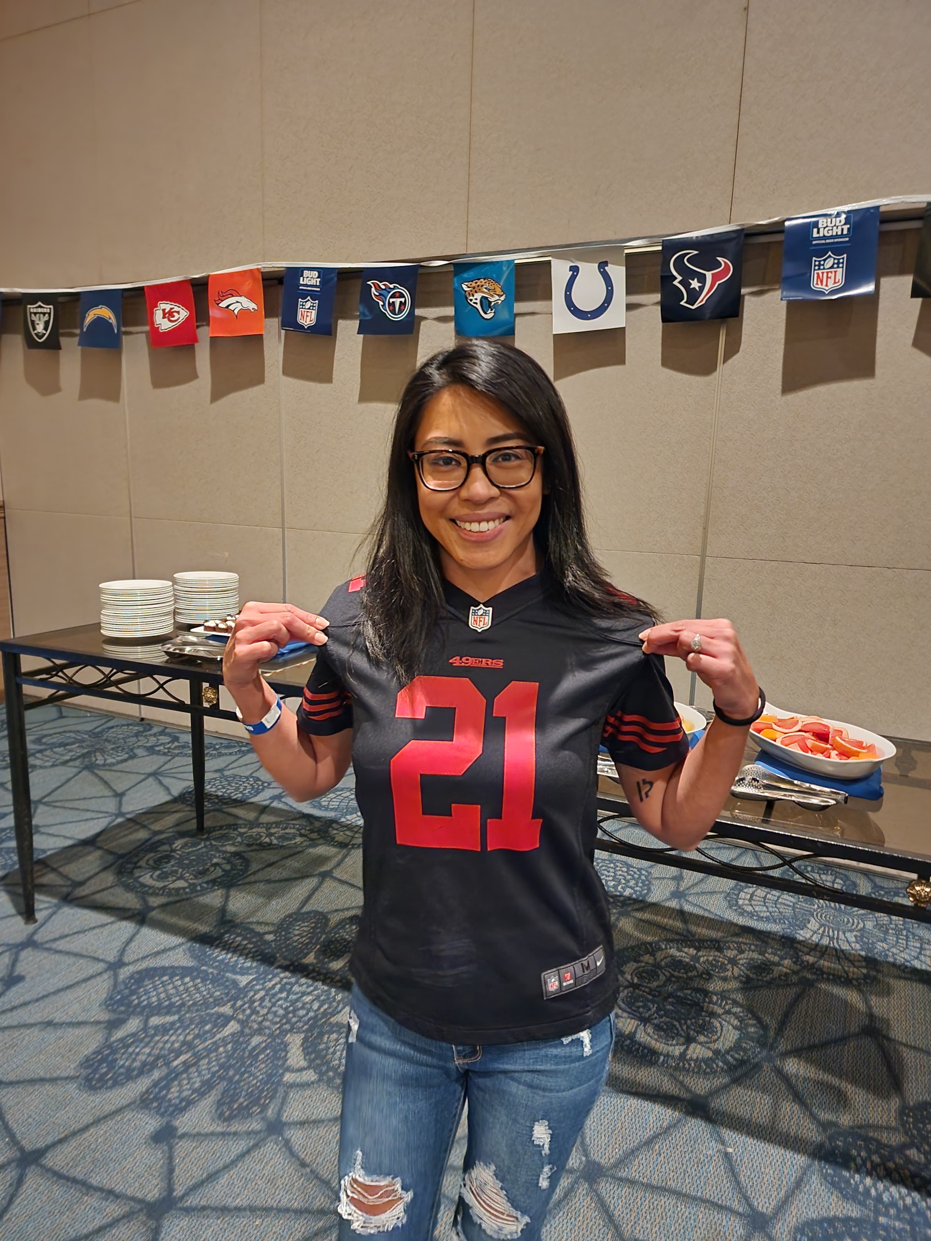 Raquel Aquon, a San Francisco 49ers fan, poses for a photo at Saipan World Resort.