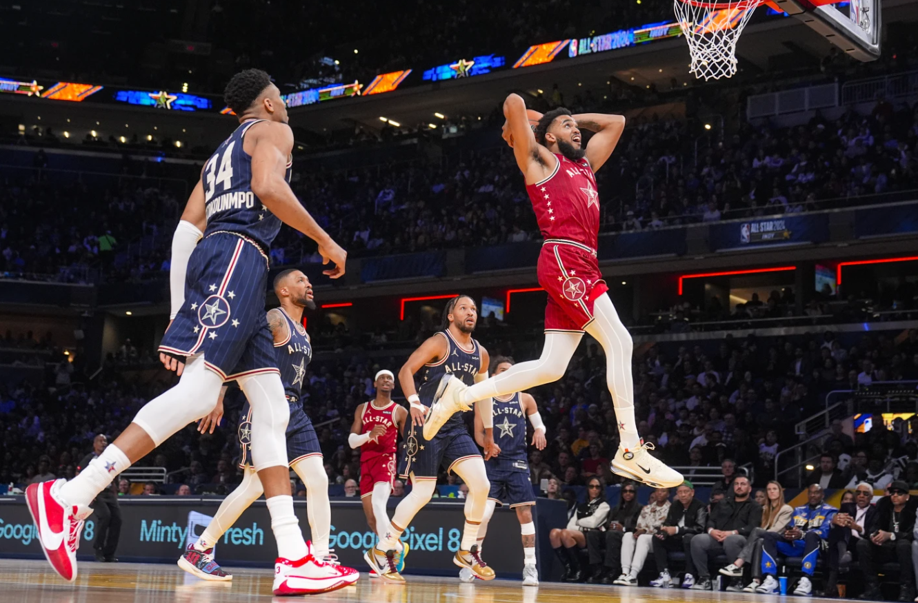 Minnesota Timberwolves forward Anthony Towns goes up for a dunk during the first half of an NBA All-Star game in Indianapolis, Sunday, Feb. 18, 2024. 