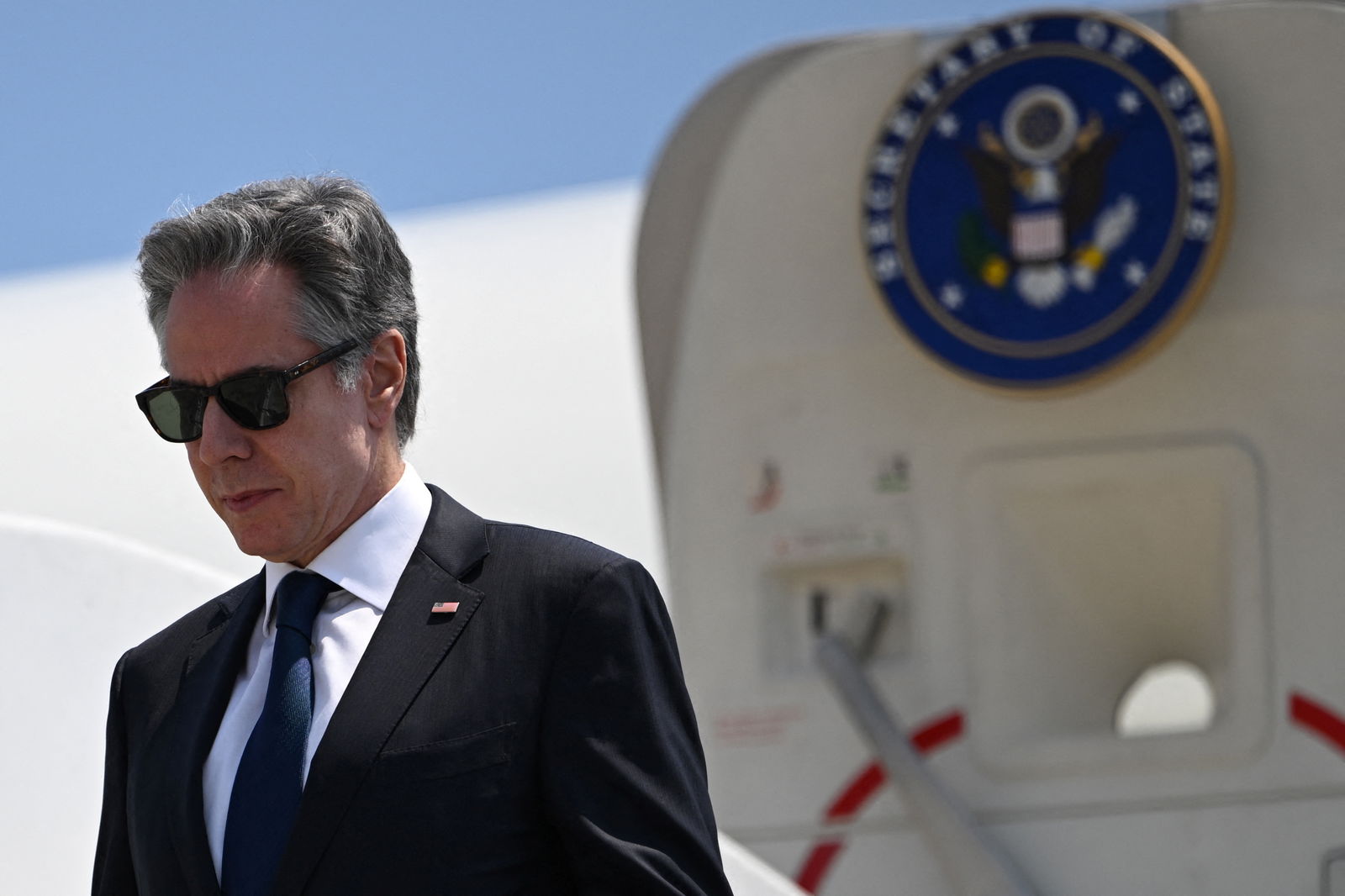 FILE PHOTO: US Secretary of State Antony Blinken disembarks a plane upon arrival at Norman Manley International Airport, in Kingston, Jamaica, March 11, 2024. 