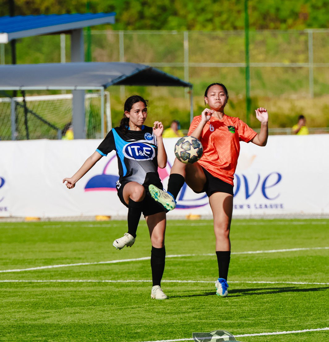 Kanoa Football Club's Audrey Castro reaches out to secure the possession during a game against MP United Football Club in the Tinekcha-Awaal (Premier) Division of the 2024 Dove Women’s League at the NMI Soccer Training Center in Koblerville.