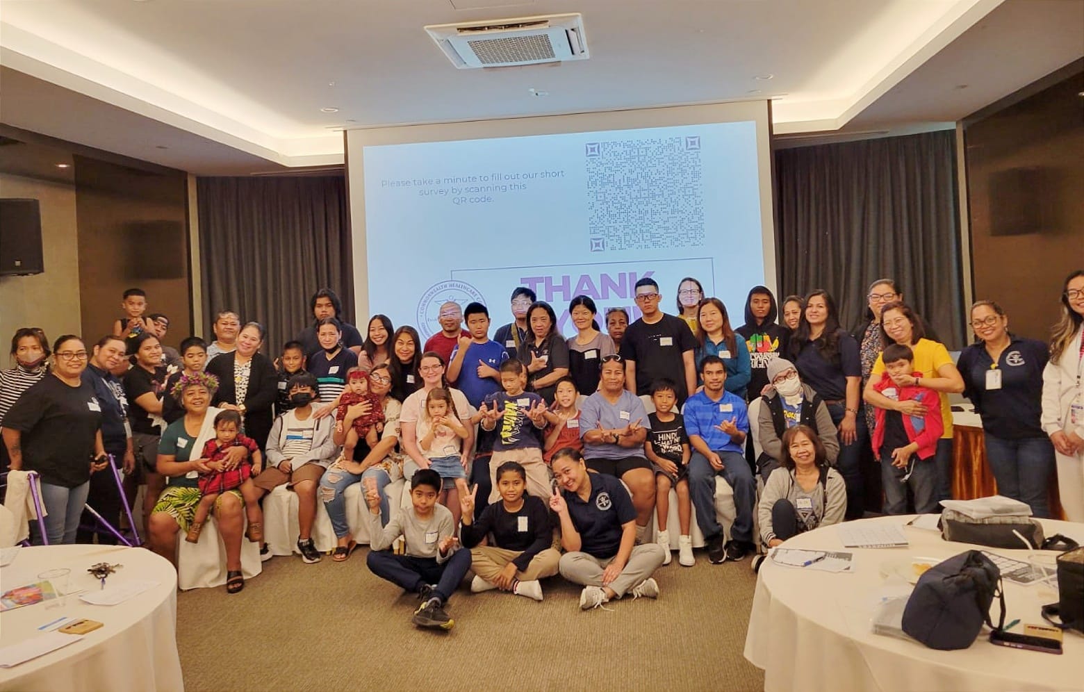 Participants of the deaf & hard of hearing family engagement workshop pose for a photo at the Saipan World Resort on March 9, 2024.