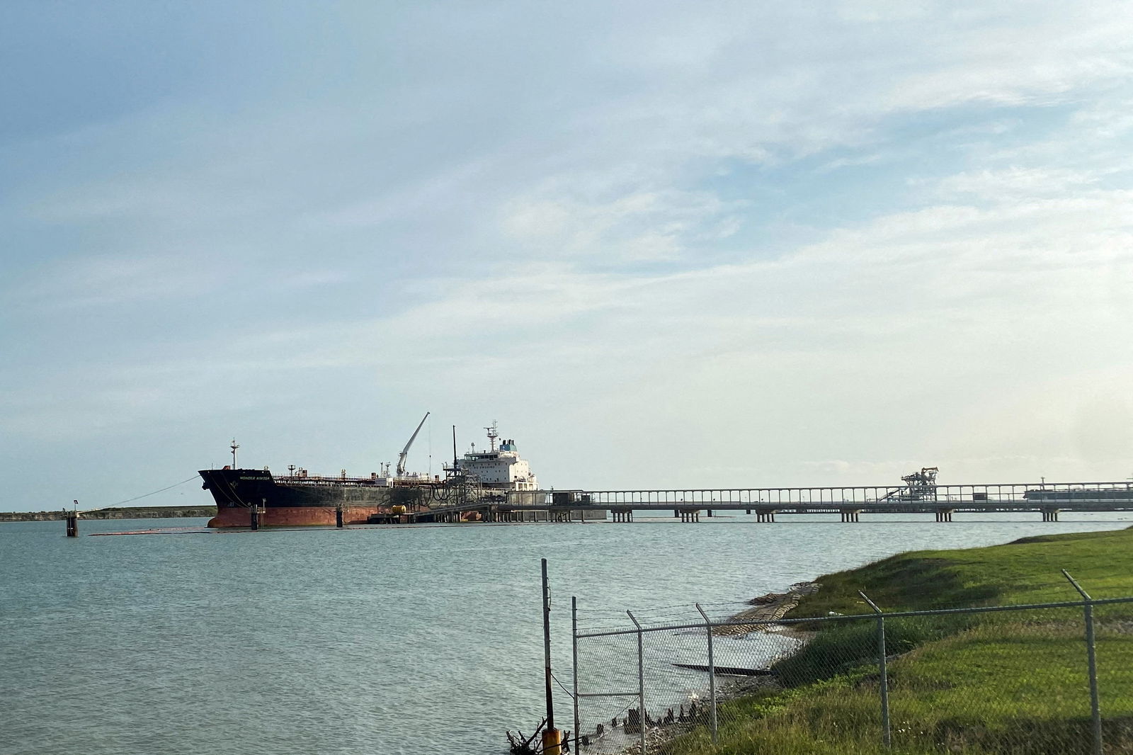 FILE PHOTO: A tanker is seen docked at Ingleside near Corpus Christi, Texas, U.S., May 14, 2023. 