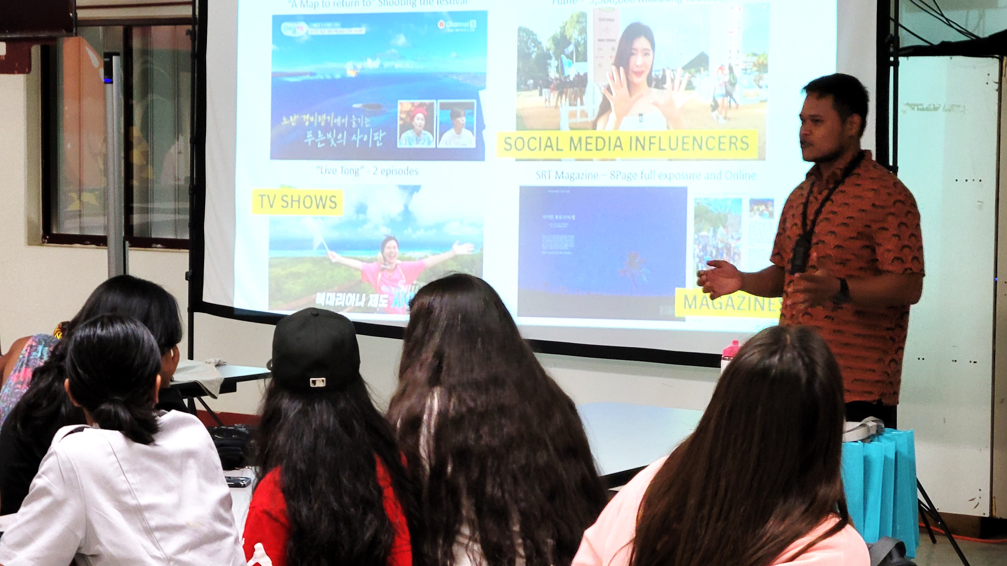 Marianas Visitors Authority Community Projects Specialist Jack Aranda shares with Kagman High School students some of the marketing strategies of the agency during the educational outreach presentation of the MVA and Marianas Tourism Education Council on Feb. 28, 2024, at the school.