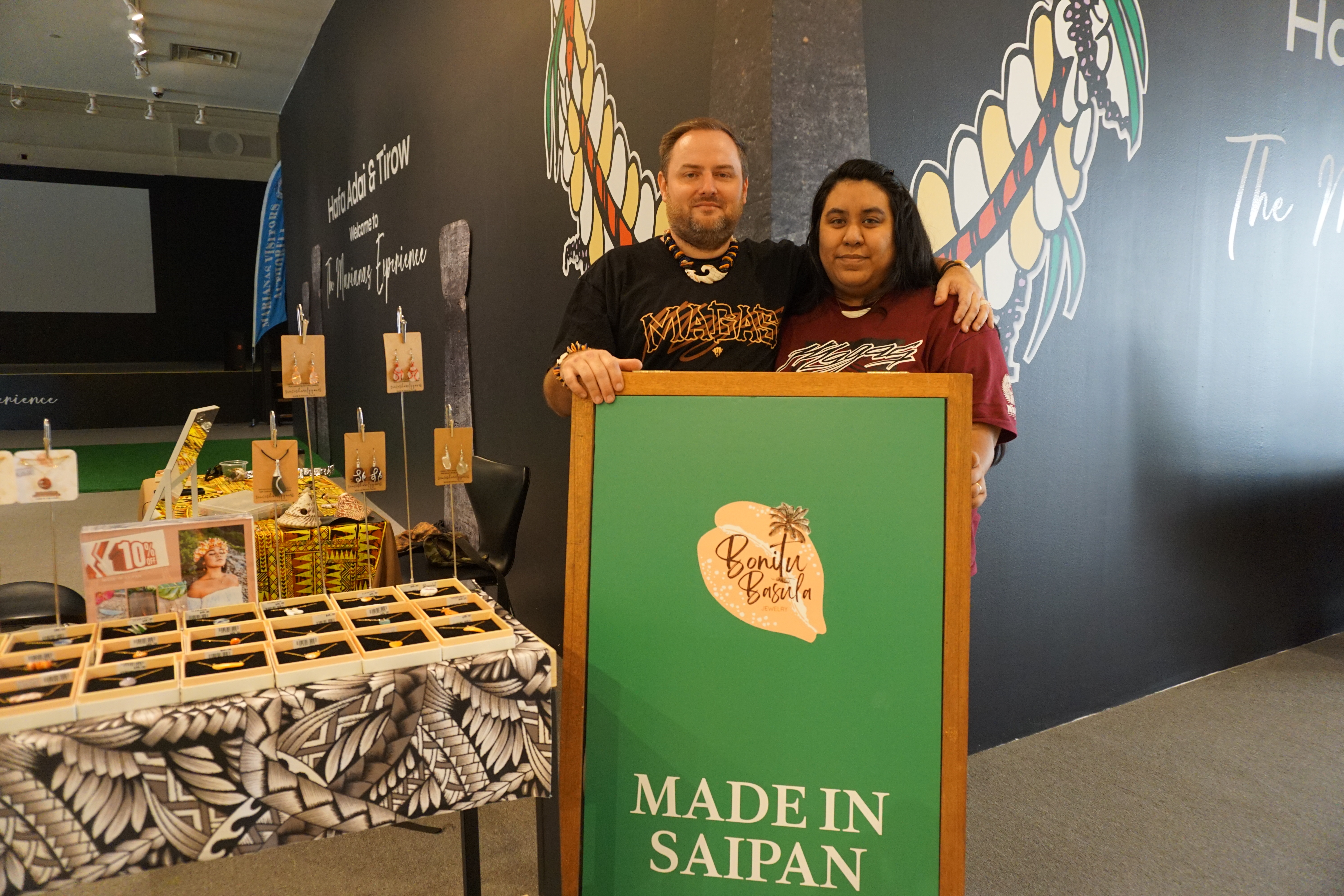 David and Milelani Vinyard pose at their pop up shop at T-Galleria.