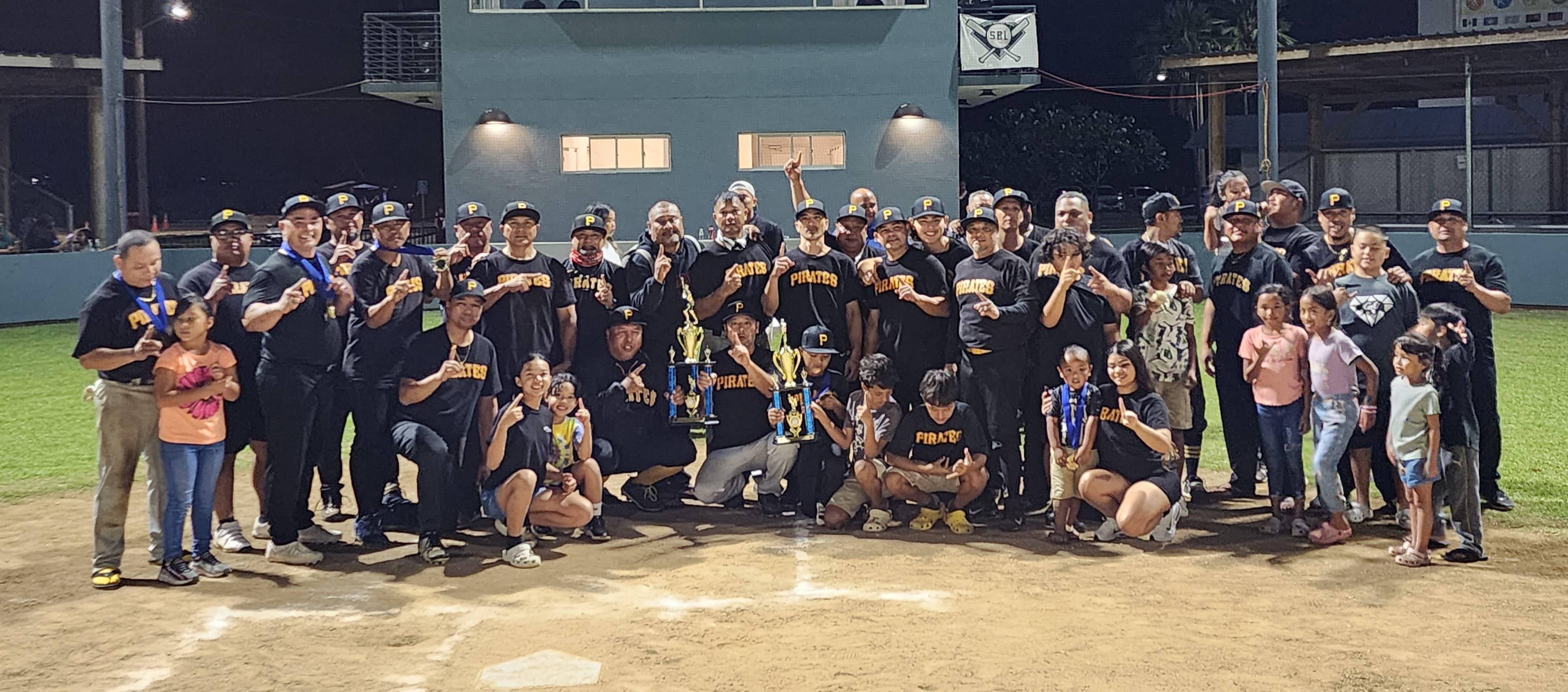 The Pirates pose for a photo with the championship trophy during the awards ceremony of the 2023 SBL Masters League at the Francisco "Tan Ko" Palacios Baseball Field on Wednesday.