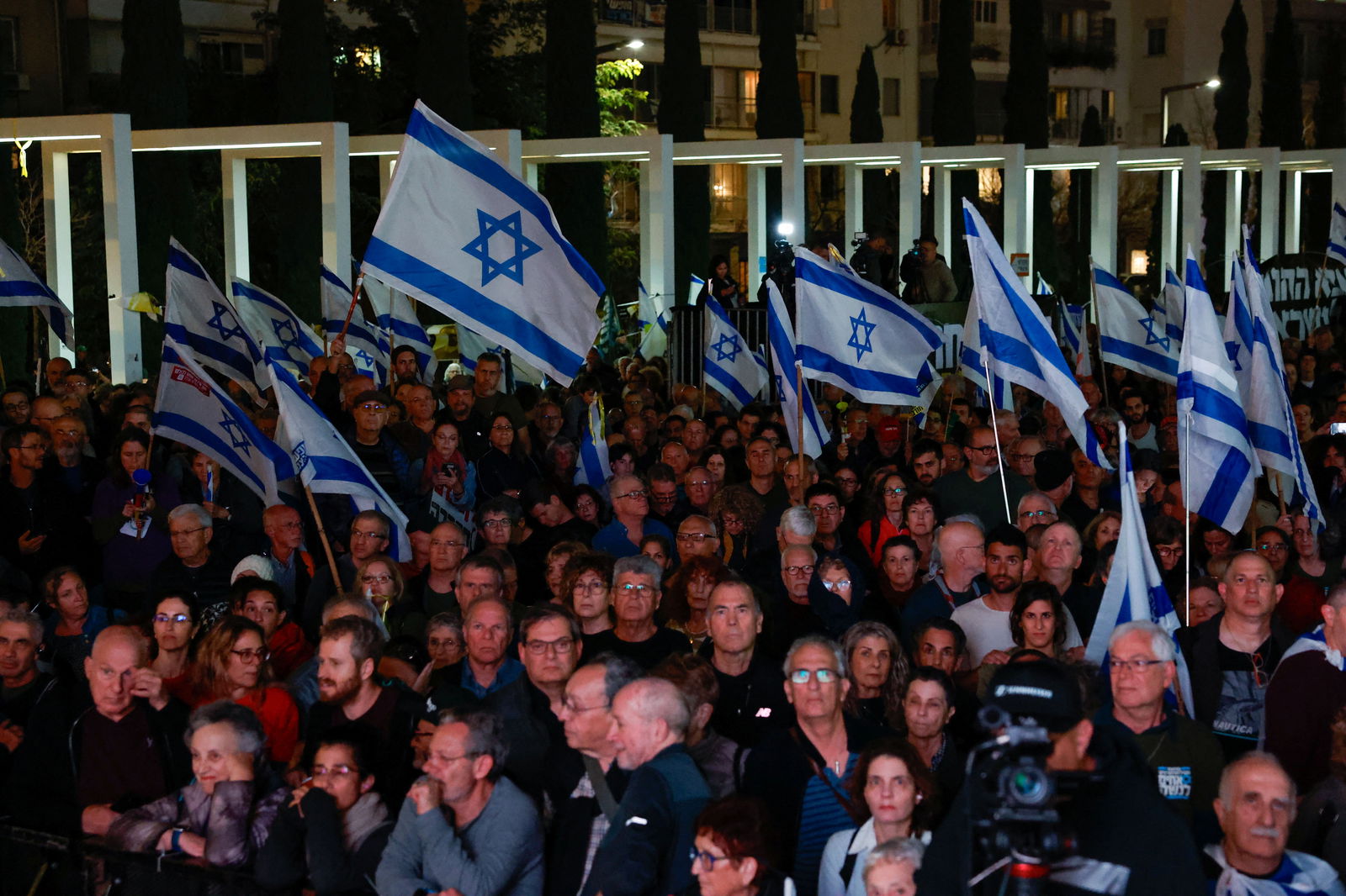 People attend a demonstration calling for the return of hostages held in Gaza since October 7 and against Israeli Prime Minister Benjamin Netanyahu's coalition government, demanding an end to the exemption of ultra-Orthodox Jewish men from compulsory military service, amid the ongoing conflict between Israel and Palestinian Islamist group Hamas, in Tel Aviv, Israel March 14, 2024. 