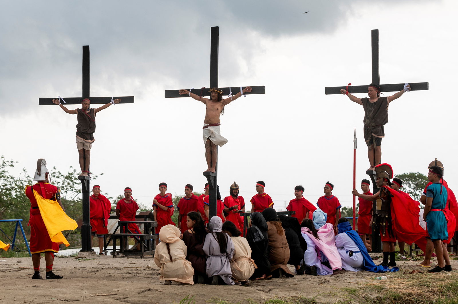 Filipino Catholic Ruben Enaje is nailed to the cross during his reenaction of the crucifixion of Jesus Christ on Good Friday, in San Fernando, Pampanga, Philippines, March 29, 2024. 