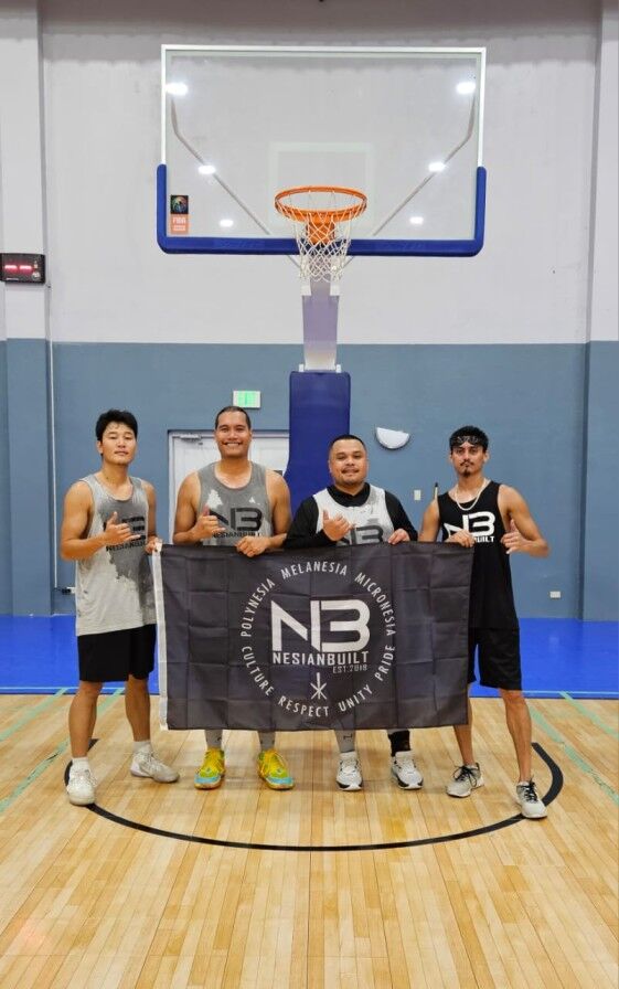 Coby Santos, Jack Lizama, Preston Basa, and Douglas Schmidt pose for a photo after winning the NMIBF Marianas Arsenal 3x3 Basketball Series last month at the Ada gym.