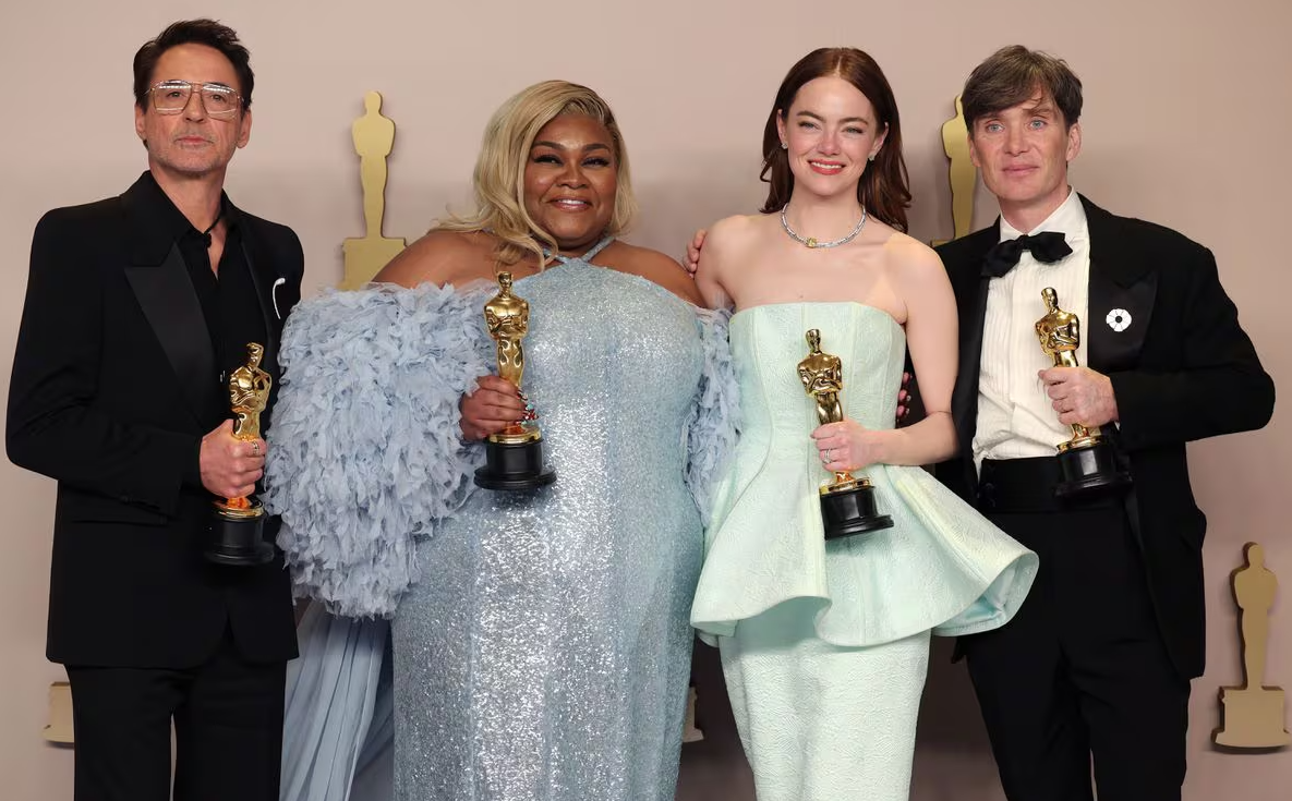 Cillian Murphy, winner of the Best Actor Oscar for "Oppenheimer," joins Emma Stone, winner of the Best Actress Oscar for "Poor Things," Da'Vine Joy Randolph, Best Supporting Actress Oscar winner for "The Holdovers," and Robert Downey Jr., Best Supporting Actor Oscar winner for "Oppenheimer" in the Oscars photo room at the 96th Academy Awards in Hollywood, Los Angeles, California, March 10, 2024.