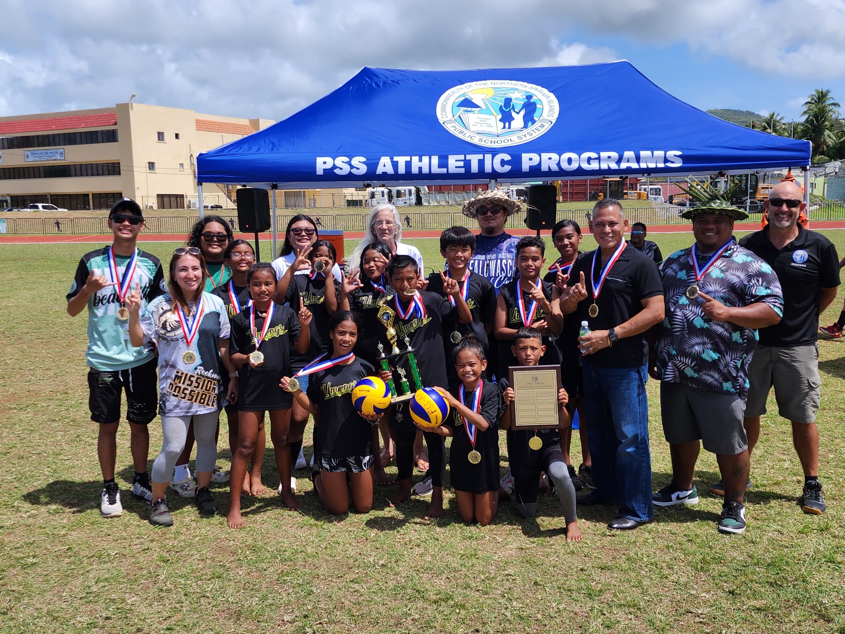 The Koblerville Elementary School Umangs pose for a photo after winning their third straight NMIVA-PSS Interscholastic Volleyball League co-ed elementary school division championship at the Oleai Sports Complex on Saturday.