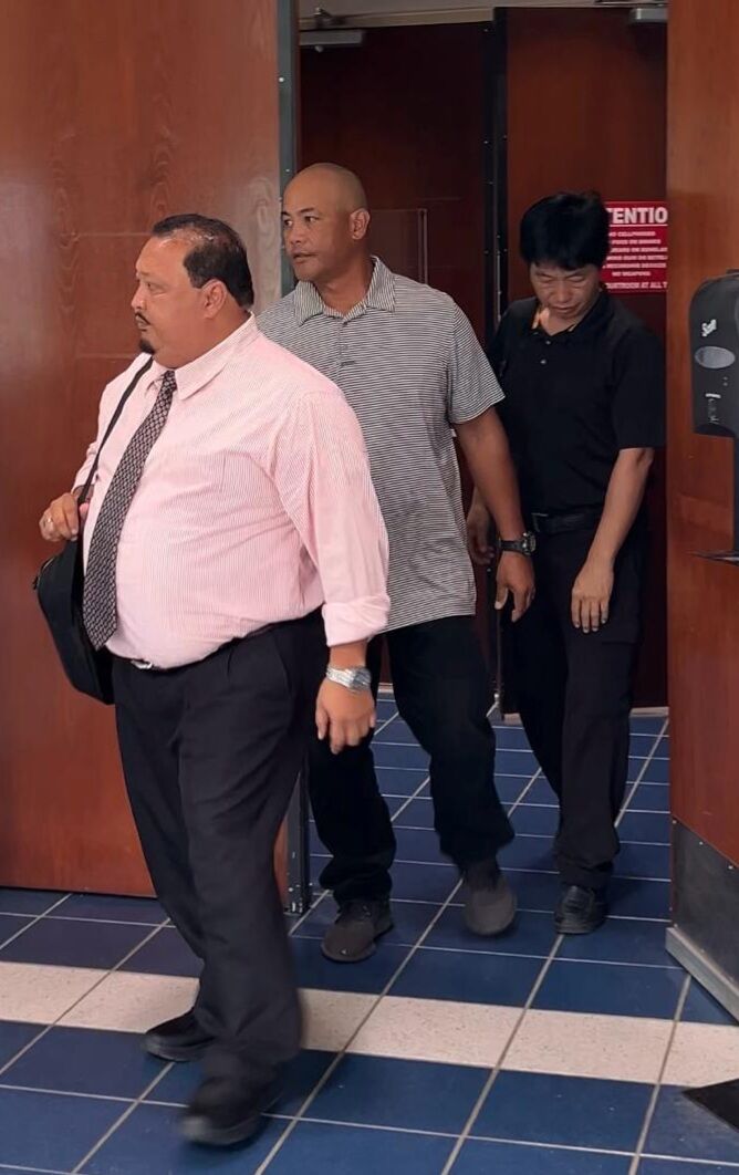 Nick Masga Reyes and co-defendant Chuilian Fu leave the courtroom on Tuesday afternoon. Also in the photo is Reyes’ attorney, Joaquin Torres.