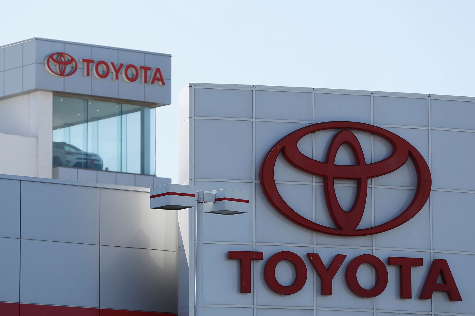 FILE PHOTO: Toyota logos are seen at City Toyota in Daly City, California, U.S., October 3, 2017. 