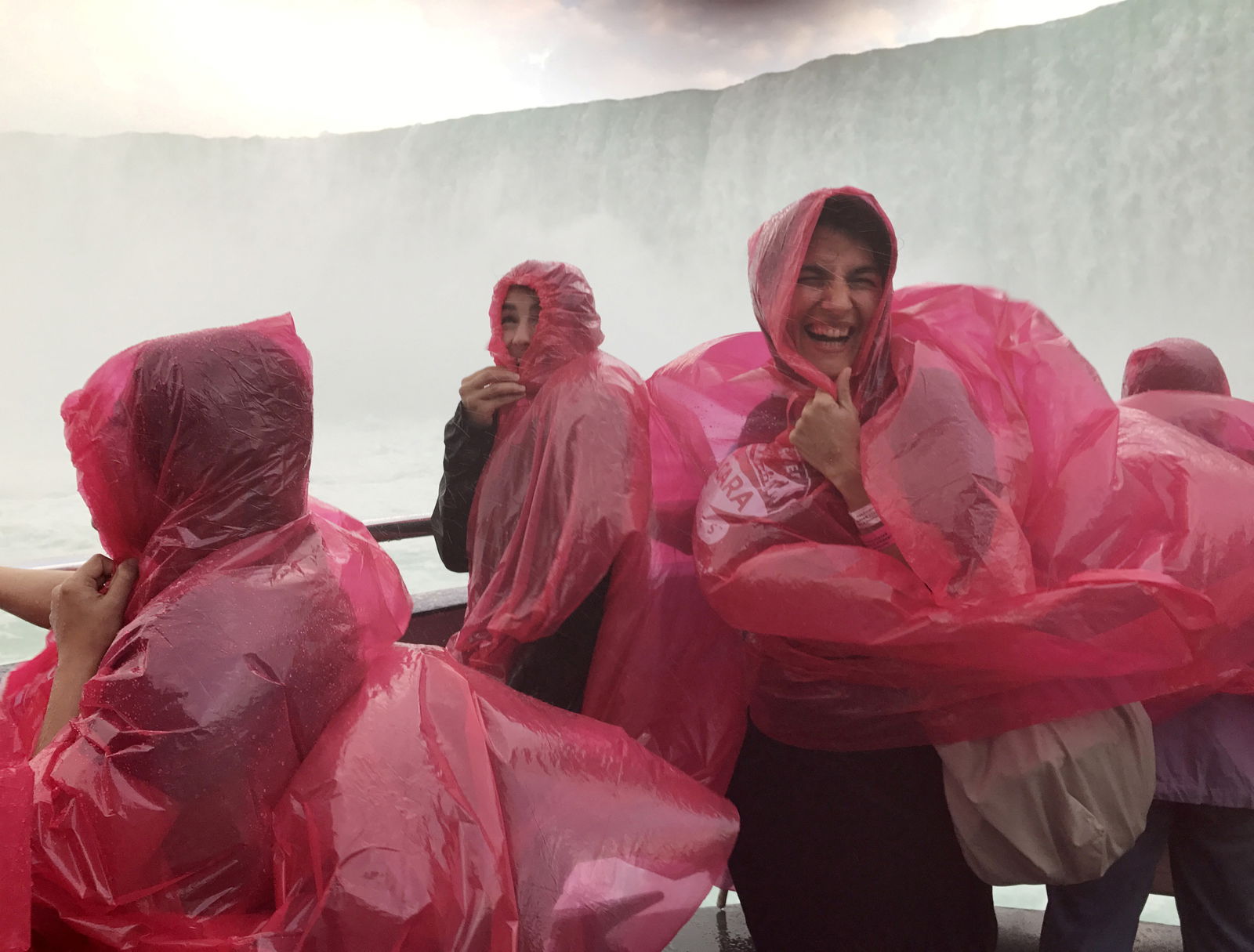 FILE PHOTO: A Croatian tourist reacts to the water spray while riding a ferry at Niagara Falls, Ontario, Canada August 12, 2017. 