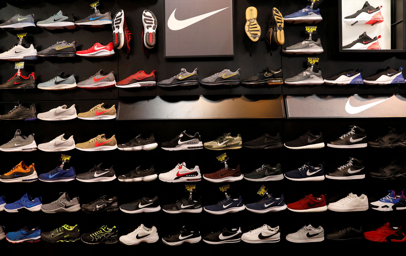 FILE PHOTO: Nike shoes are seen displayed at a sporting goods store in New York City, New York, U.S., May 14, 2019. 