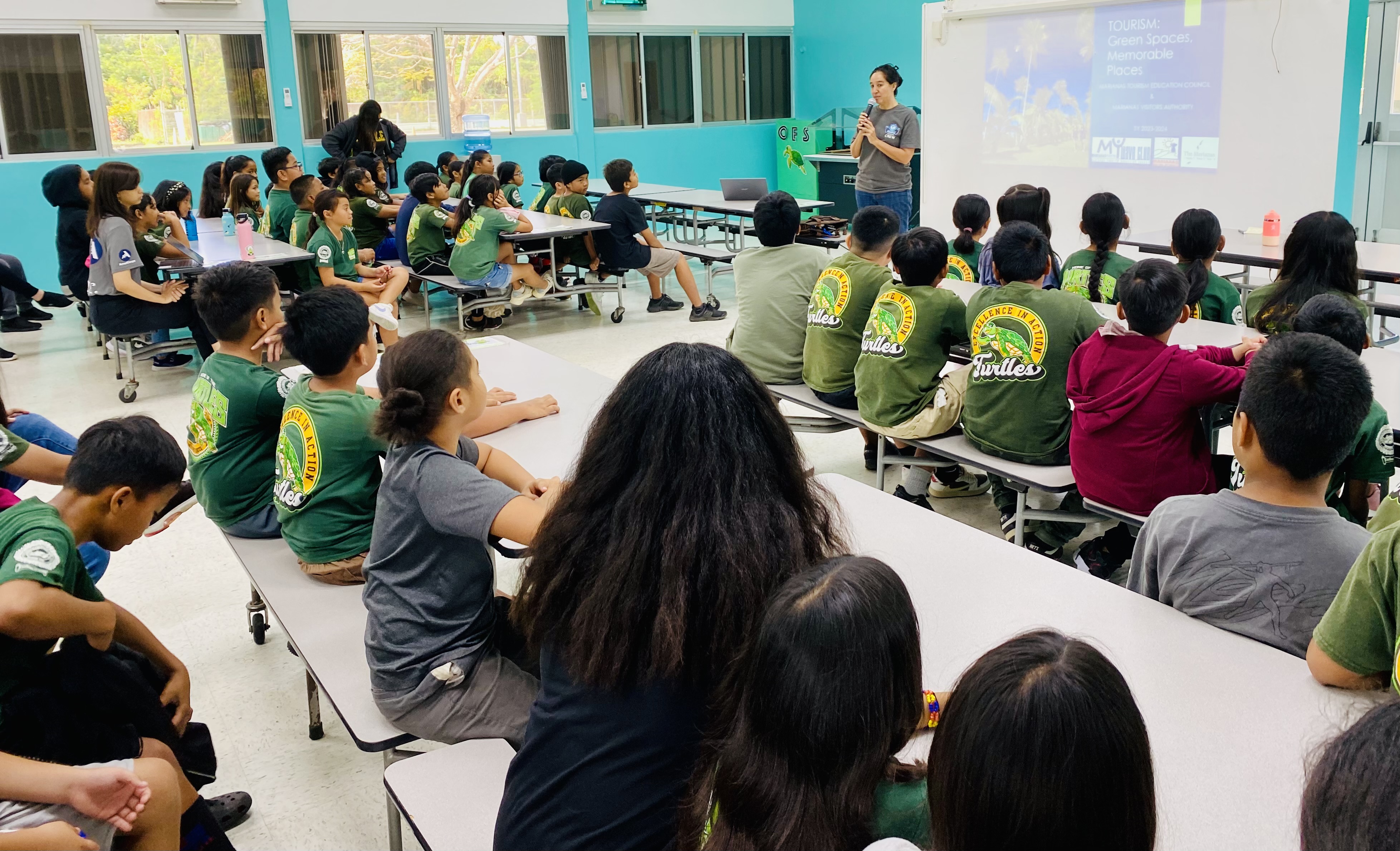 Fourth graders at Oleai Elementary learn about tourism from Marianas Tourism Education Council Board Member Catherine Perry during the educational outreach of MTEC and the Marianas Visitors Authority on March 6, 2024, at the school.