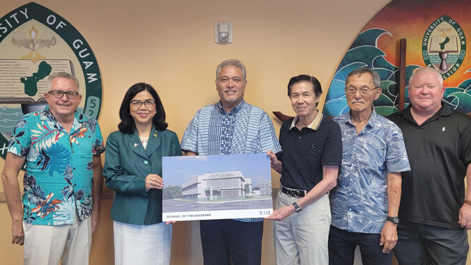 Dean Brennon Morioka, of the University of Hawaiʻi at Mānoa's College of Engineering, center, and Dr. Marvin Young, Professor in UH Mānoa's Department of Mechanical Engineering, fourth from left, meet with Dr. Anita Borja Enriquez, President of the University of Guam, and others in September 2022 to kick off their partnership that also includes the Pearl Harbor Naval Shipyard. 