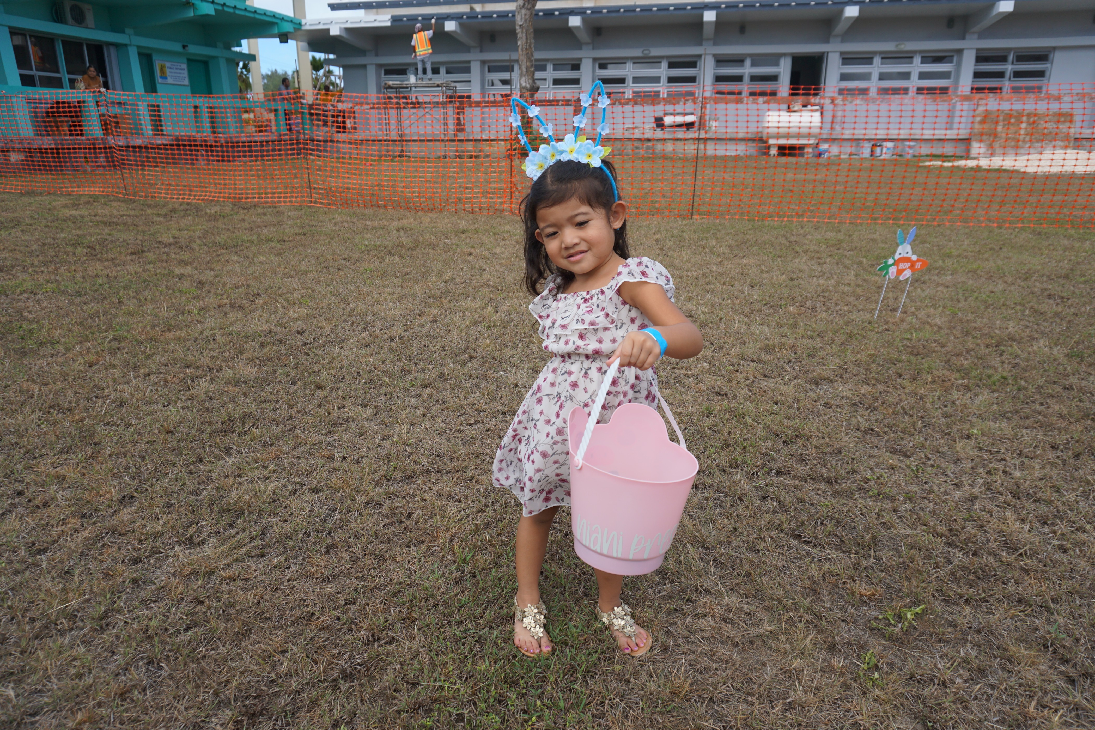 Niani Santos shows her bounty following an Easter egg hunt at Joeten-Kiyu Public Library on Thursday, March 28​.