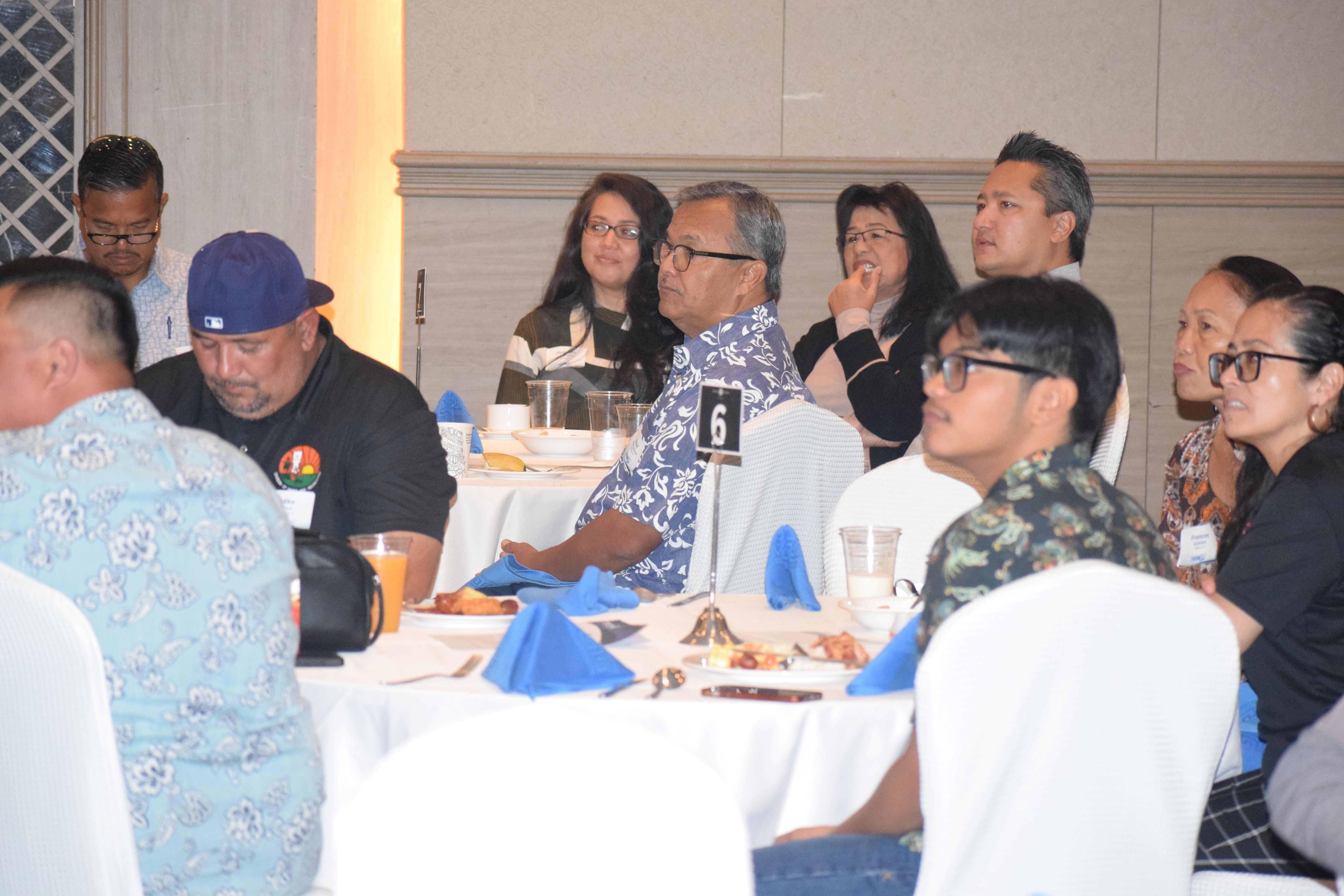 Sen. Paul A. Manglona, center, Marianas Visitor Authority Managing Director Christopher Concepcion, third right, and Department of Public Lands Secretary Teresita Santos are among those who attended the economic summit.