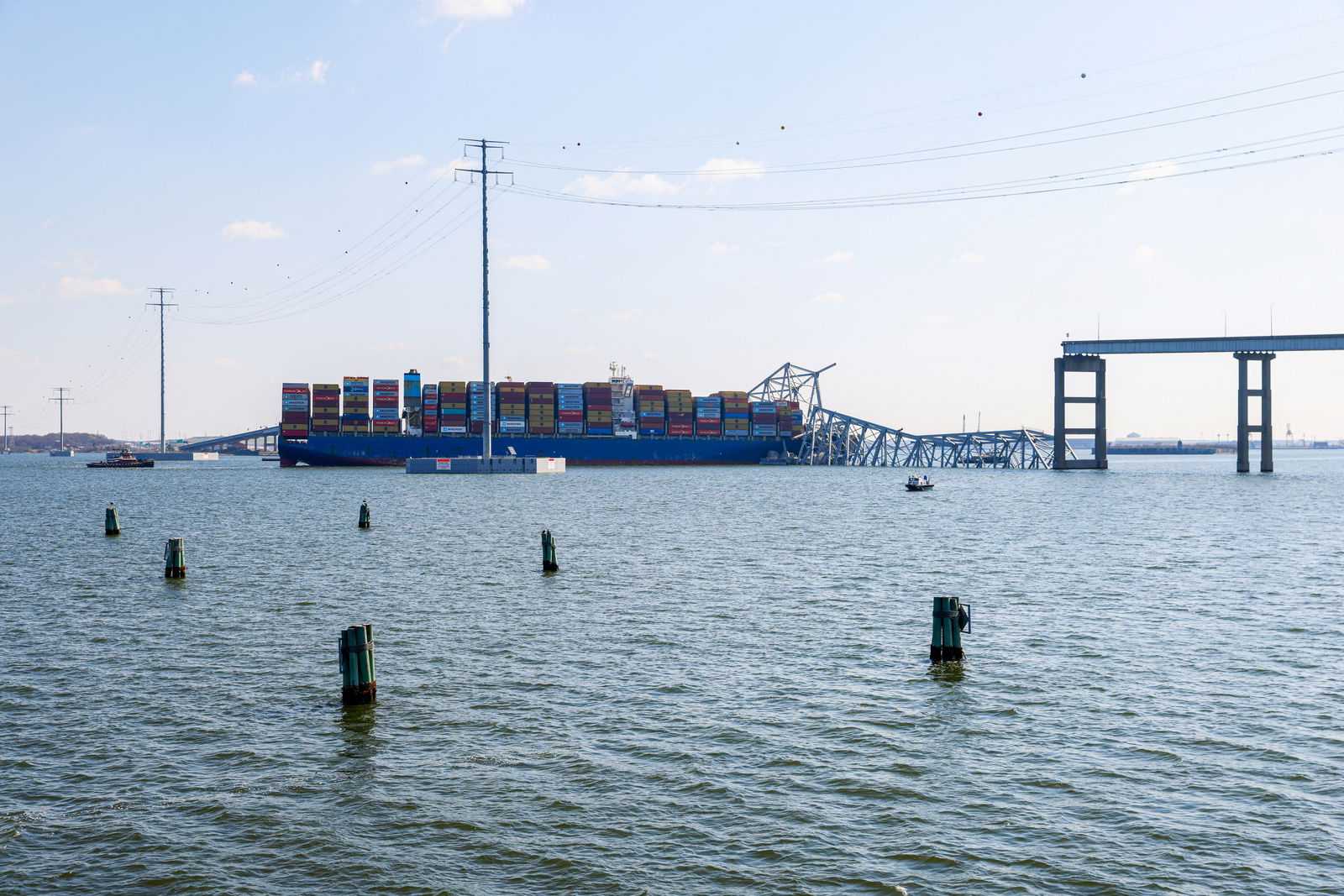 Wreckage lies across the deck of the Dali cargo vessel, which crashed into the Francis Scott Key Bridge causing it to collapse, in Baltimore, Maryland, U.S., March 29, 2024. 