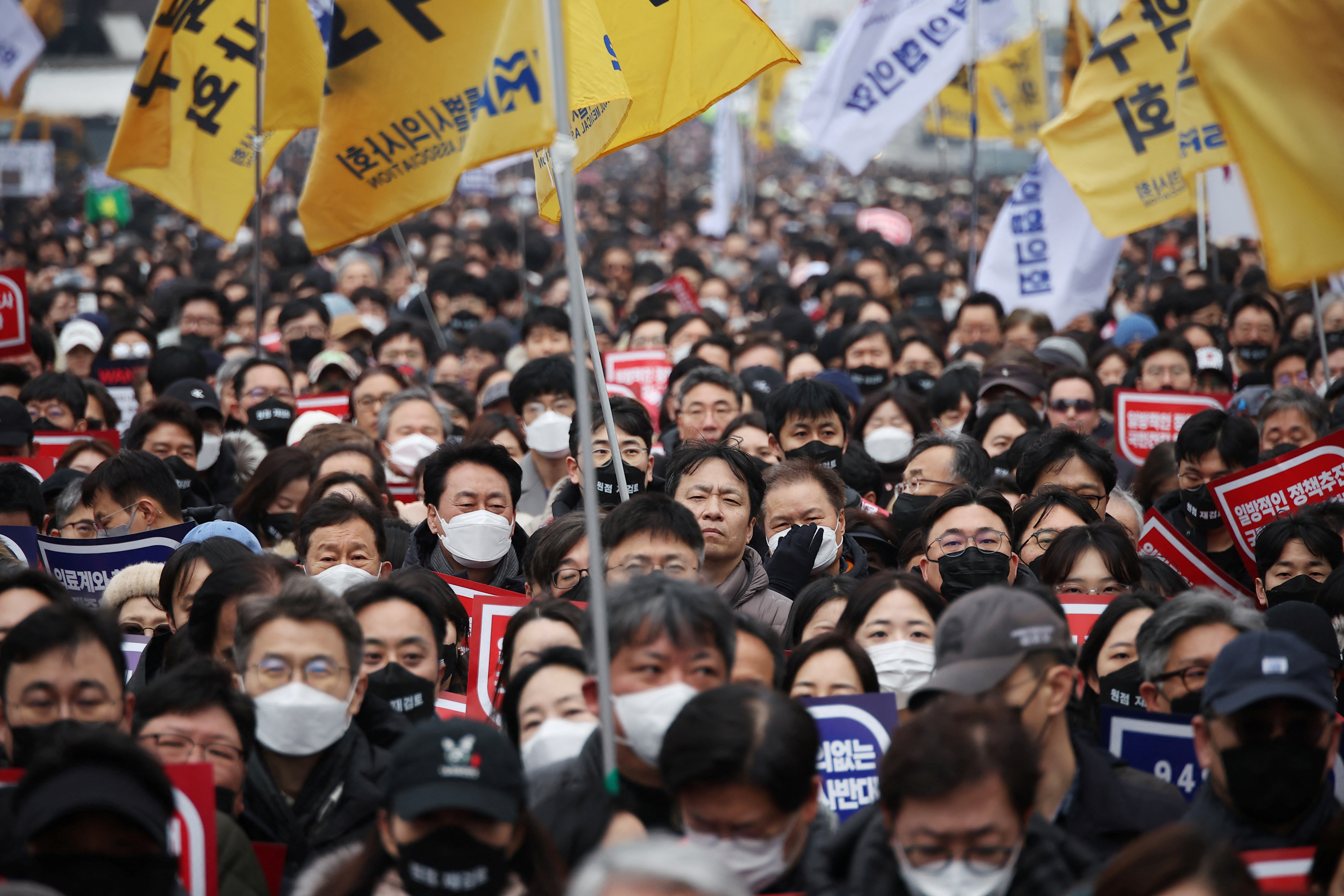Doctors take part in a rally to protest against government plans to increase medical school admissions in Seoul, South Korea, March 3, 2024. 