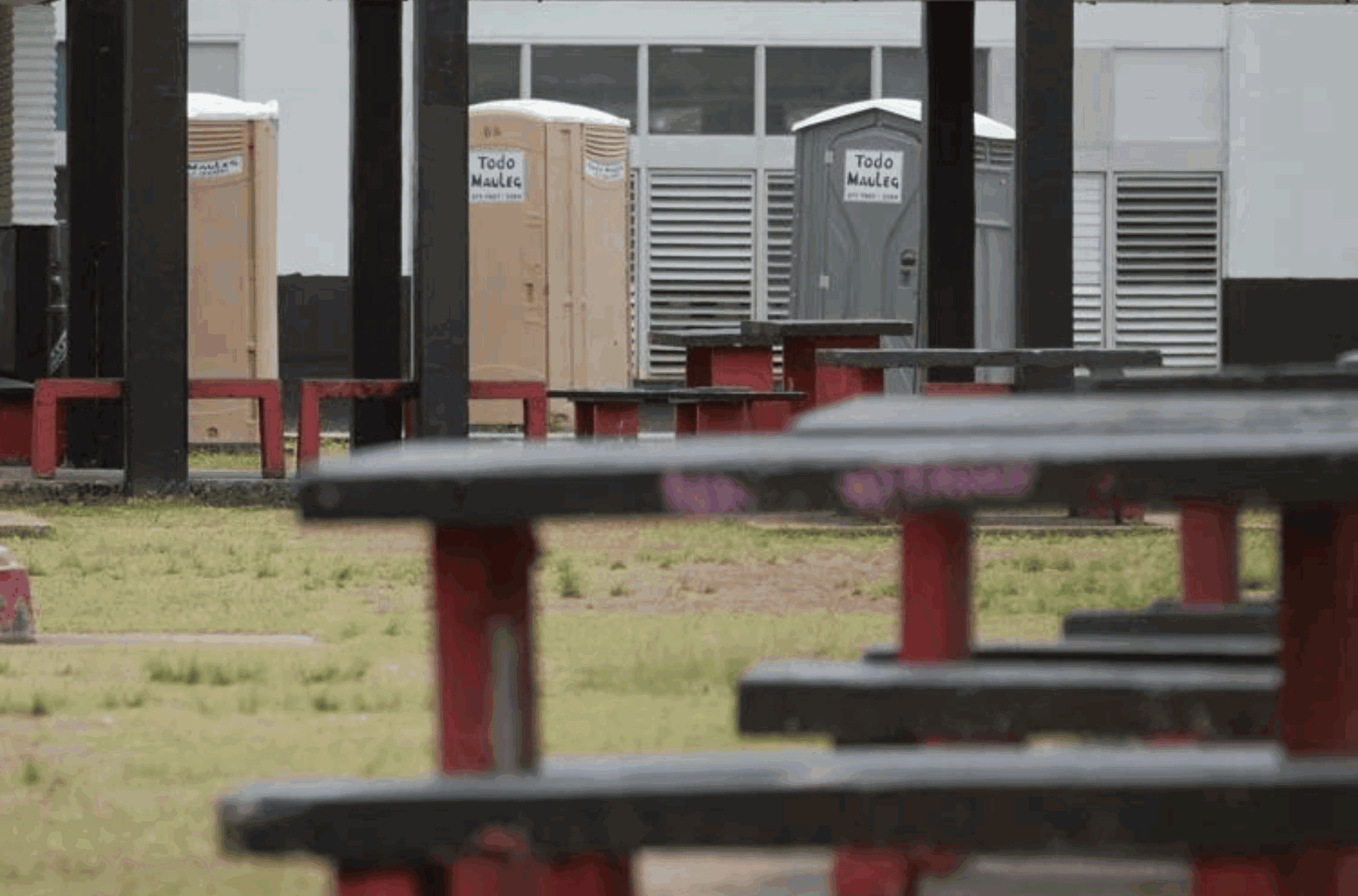 Portable restrooms on the Agueda I. Johnston Middle School campus in Ordot on Thursday, March 14, 2024. 
