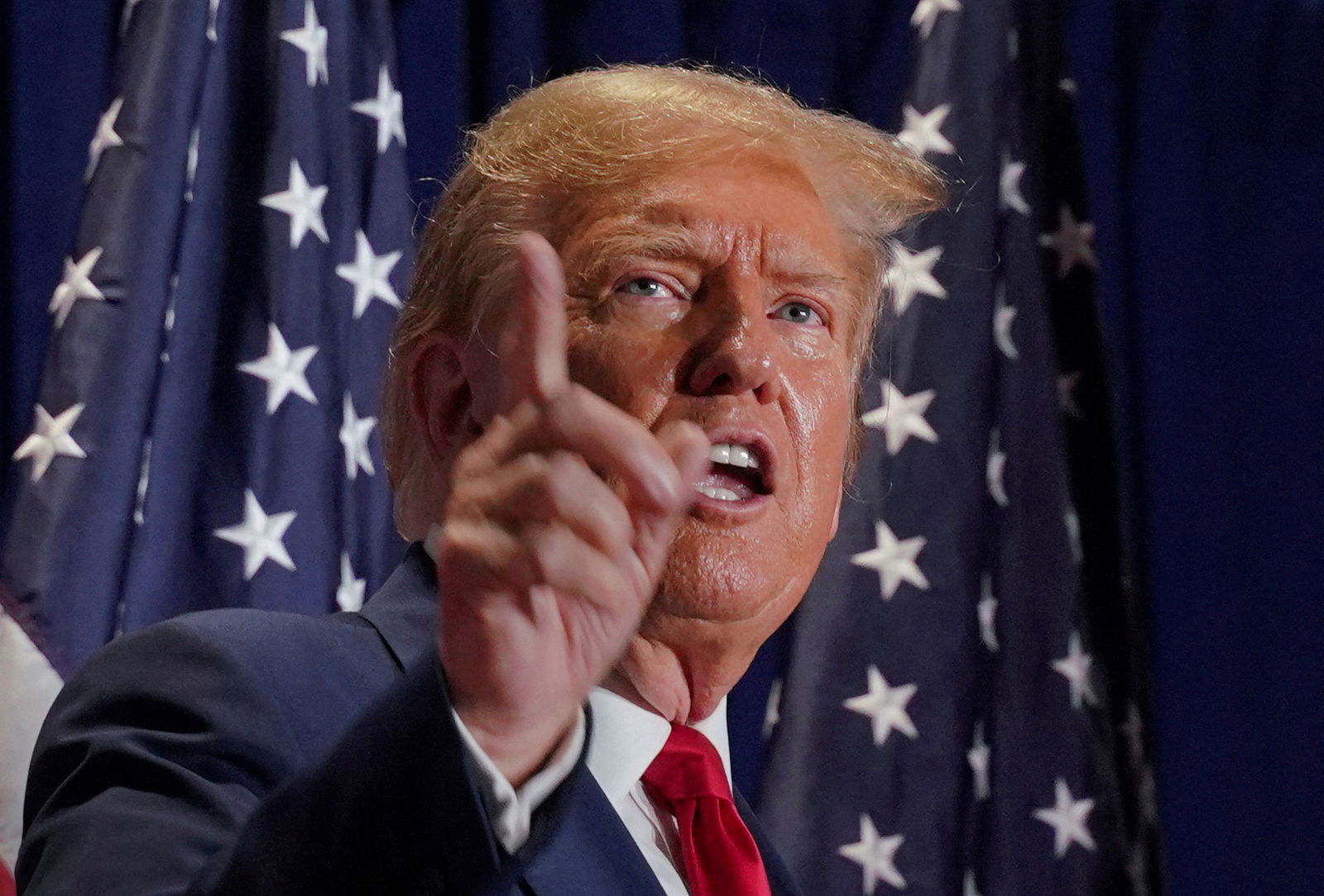FILE PHOTO: Republican presidential candidate and former U.S. President Donald Trump gestures during a campaign rally on March 2 in Richmond, Virginia, U.S. March 2, 2024. 