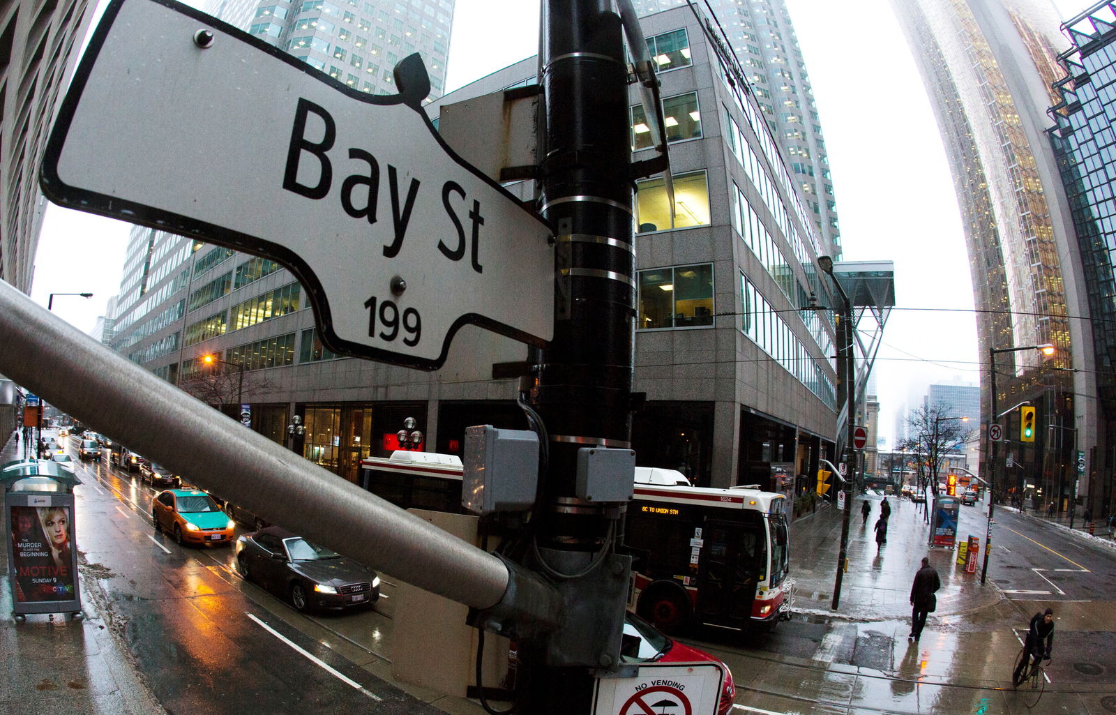 FILE PHOTO: A Bay Street sign, the main street in the financial district is seen in Toronto, January 28, 2013. 