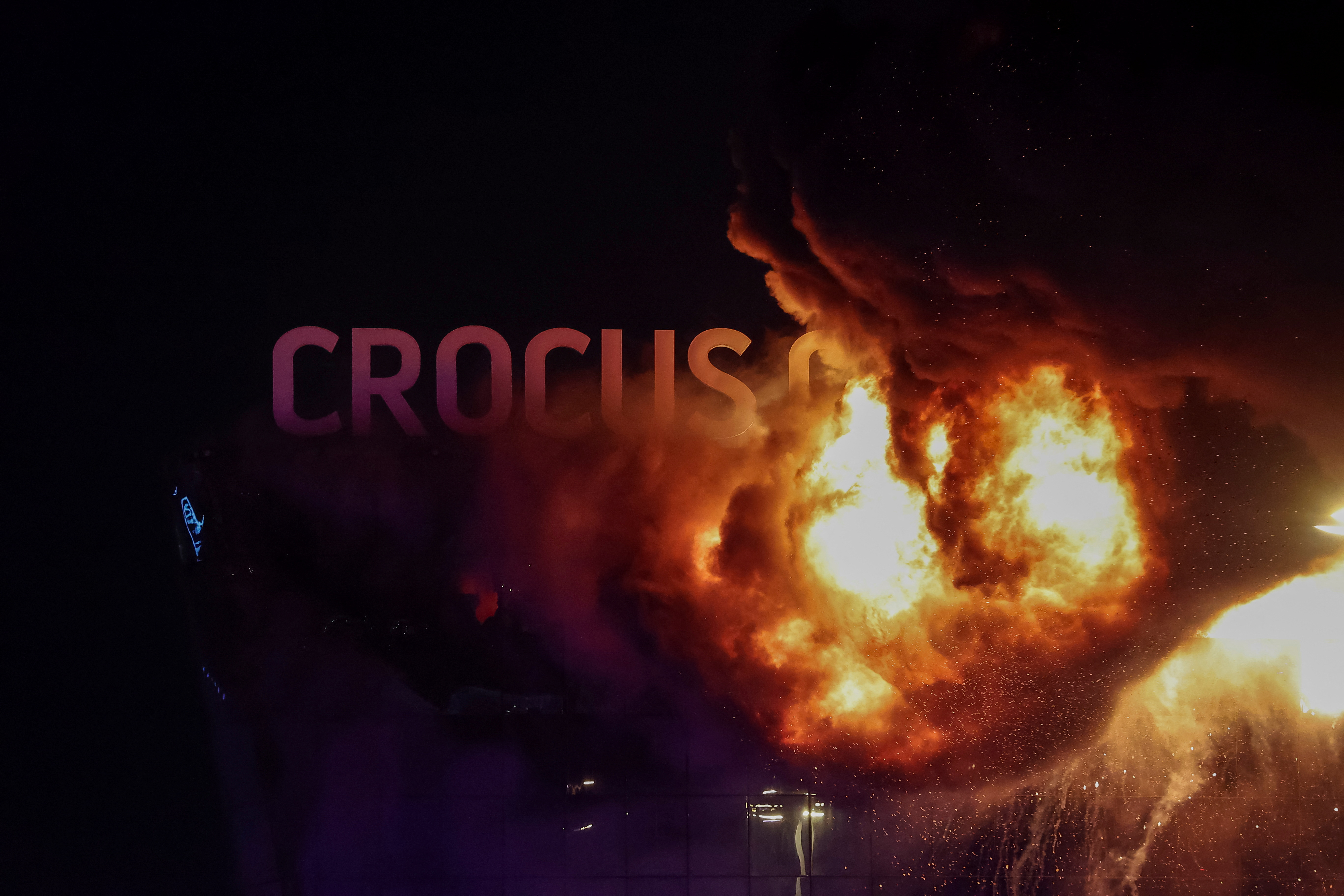View of the burning Crocus City Hall concert venue following a shooting incident, outside Moscow, Russia, March 22, 2024. 