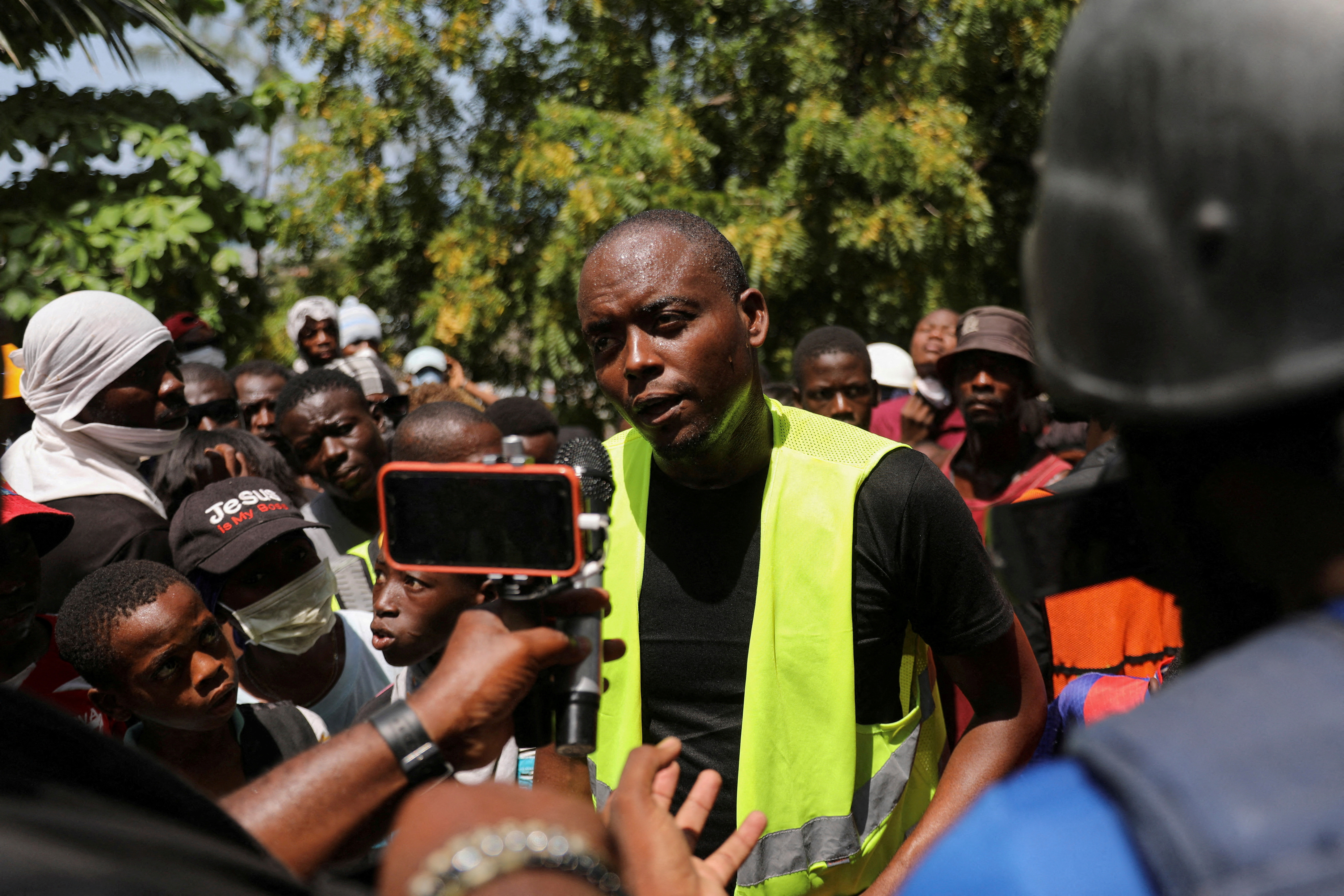 FILE PHOTO: Ezechiel Alexandre, alleged gang leader of Baz Pilat, speaks with members of the media in the Carrefour Feuilles neighborhood, which was deserted due to gang violence, in Port-au-Prince, Haiti March 19, 2024. 