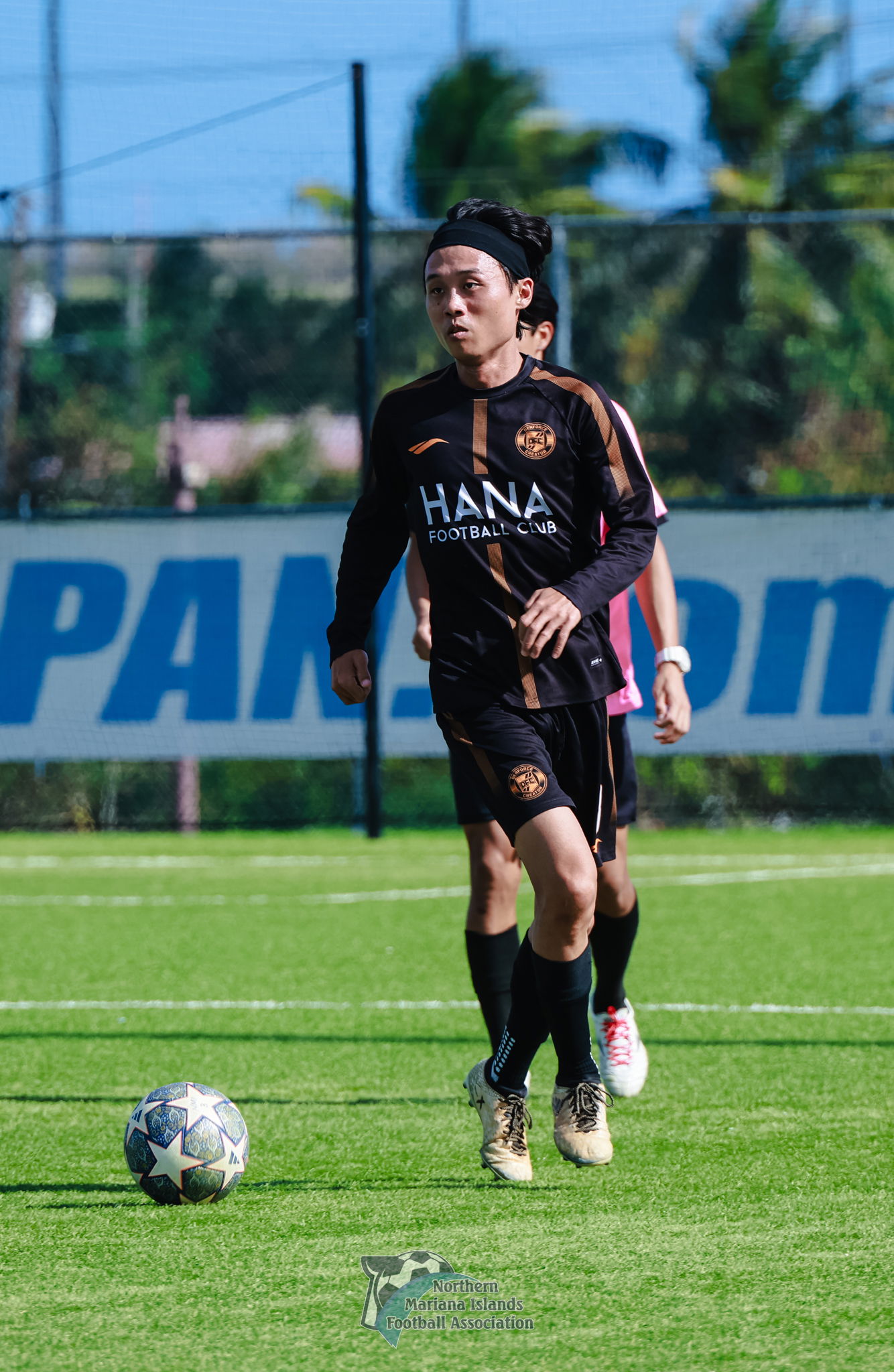 A Hana Football Club player sets up the play during a Marianas Soccer League 2 game at the NMI Soccer Training Center in Koblerville.