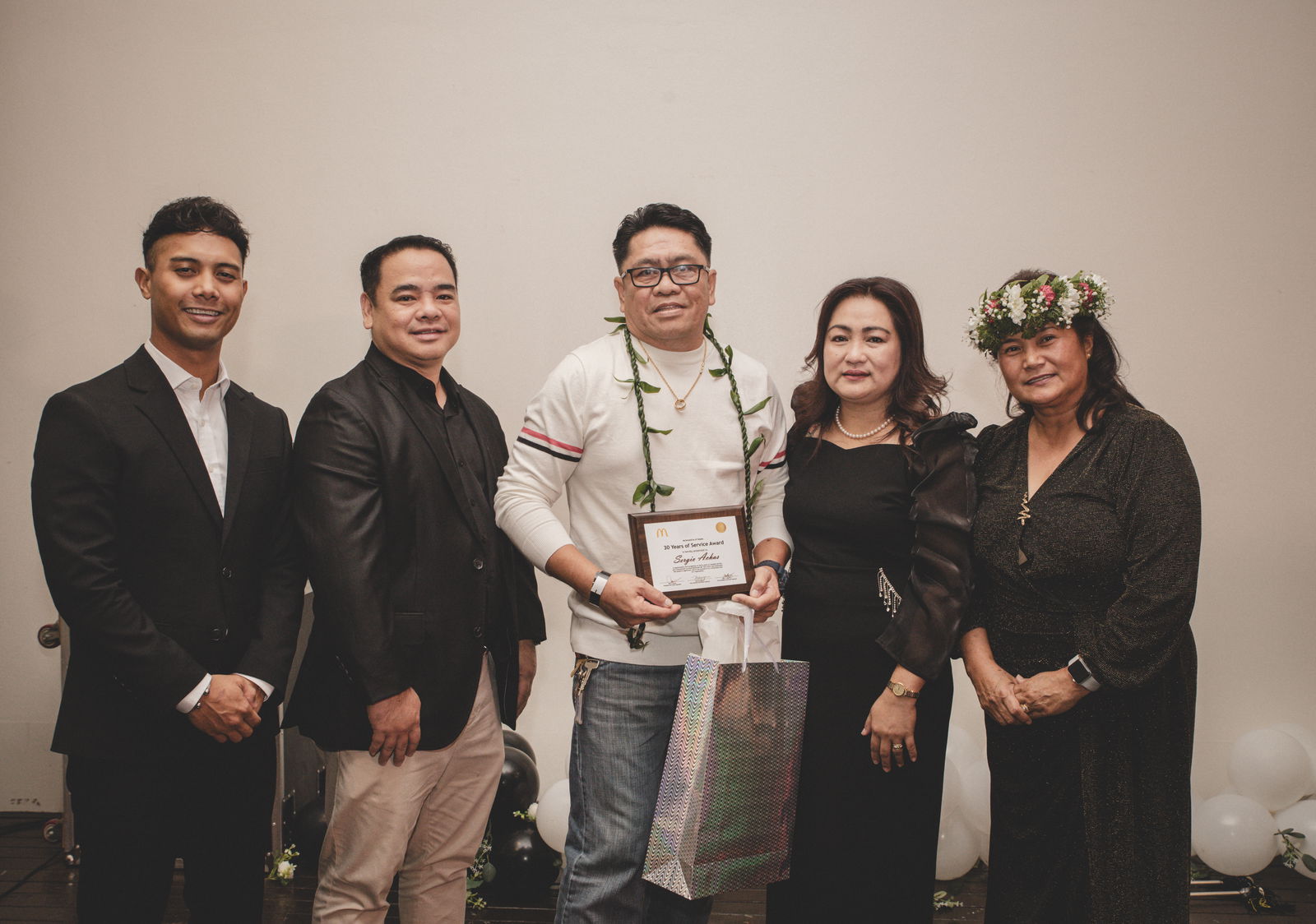 30 years service award given to Joseph Achas.