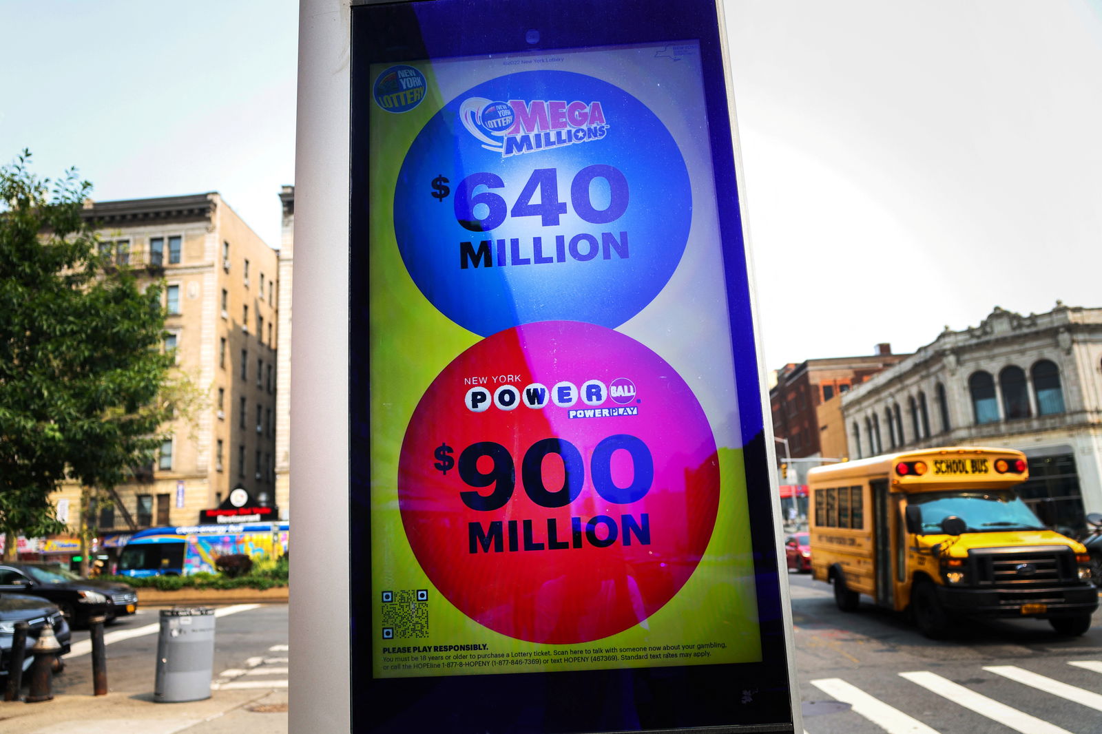 FILE PHOTO: An electronic message board displays Powerball and Mega Millions lottery jackpots in New York City, New York, U.S., July 17, 2023. 