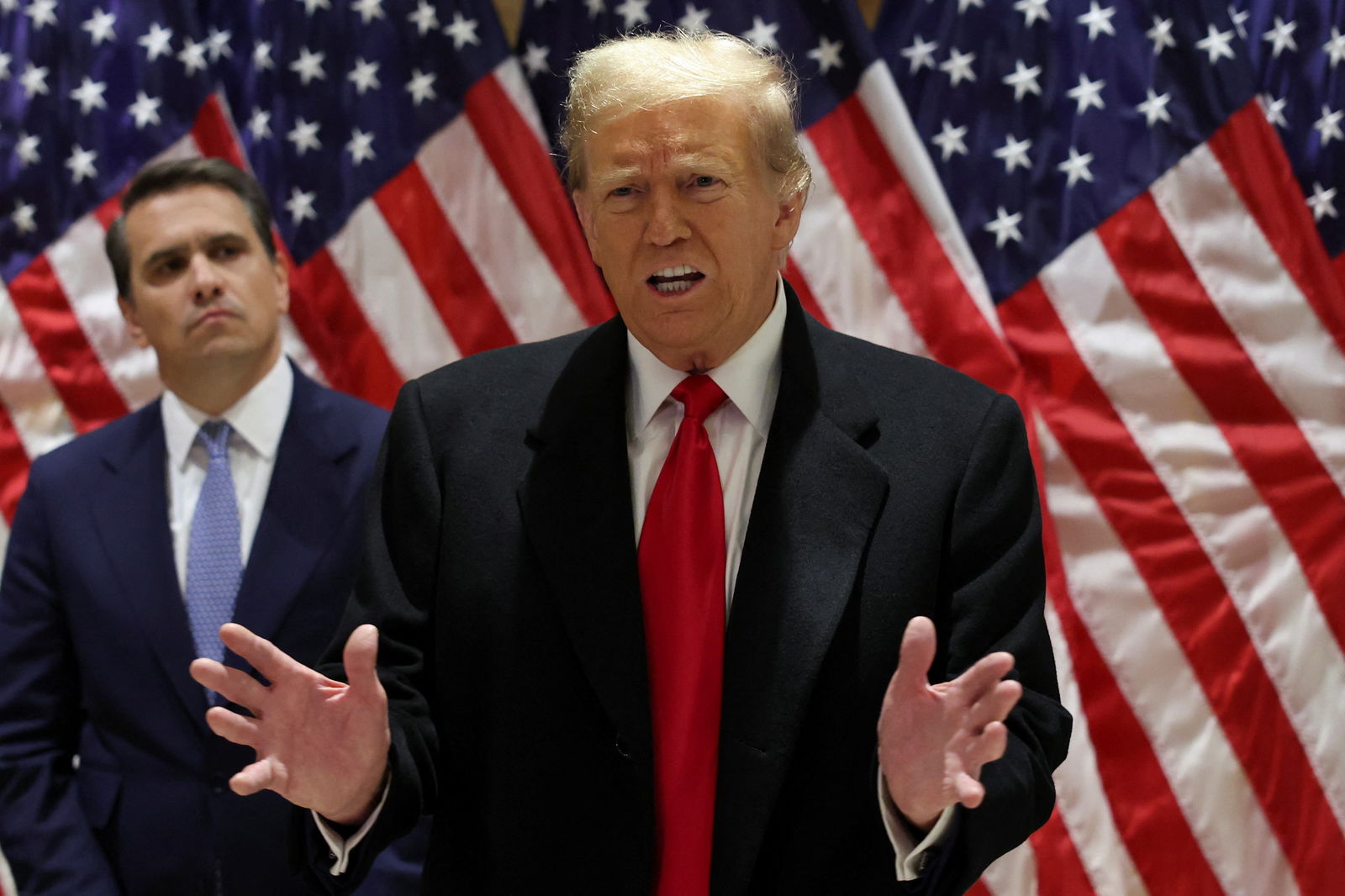 Republican presidential candidate and former U.S. President Donald Trump speaks during a press conference at one of his properties after attending a hearing in his criminal court case on charges stemming from hush money paid to a porn star in New York City, U.S., March 25, 2024. REUTERS/Shannon Stapleton