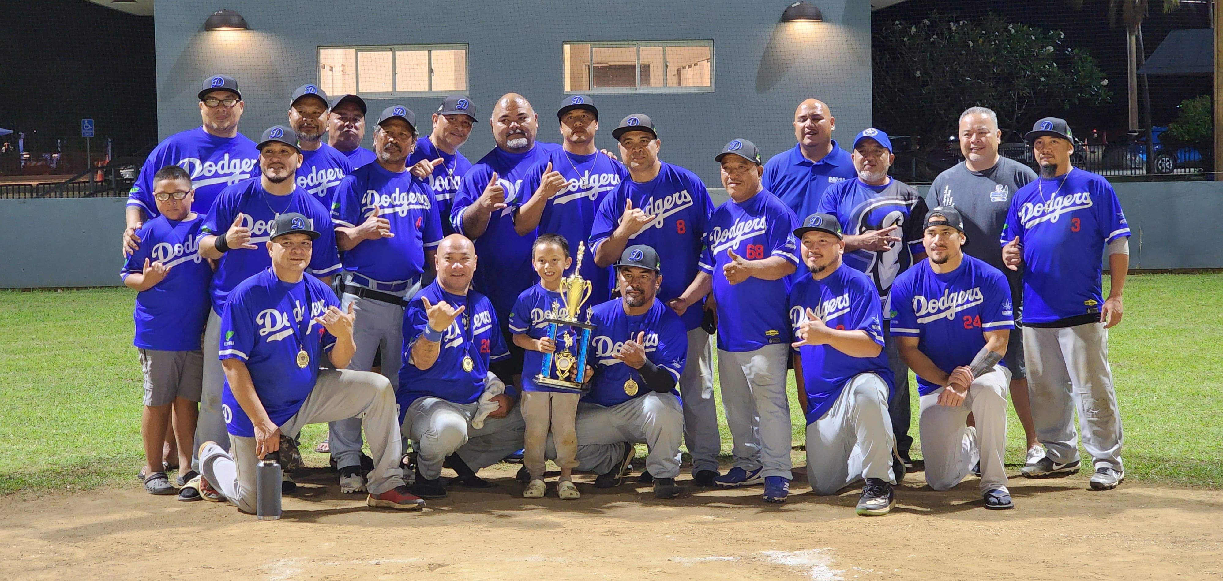 The Dodgers pose for a photo with the 2nd place trophy during the awards ceremony of the 2023 SBL Masters League at the Francisco "Tan Ko" Palacios Baseball Field on Wednesday.